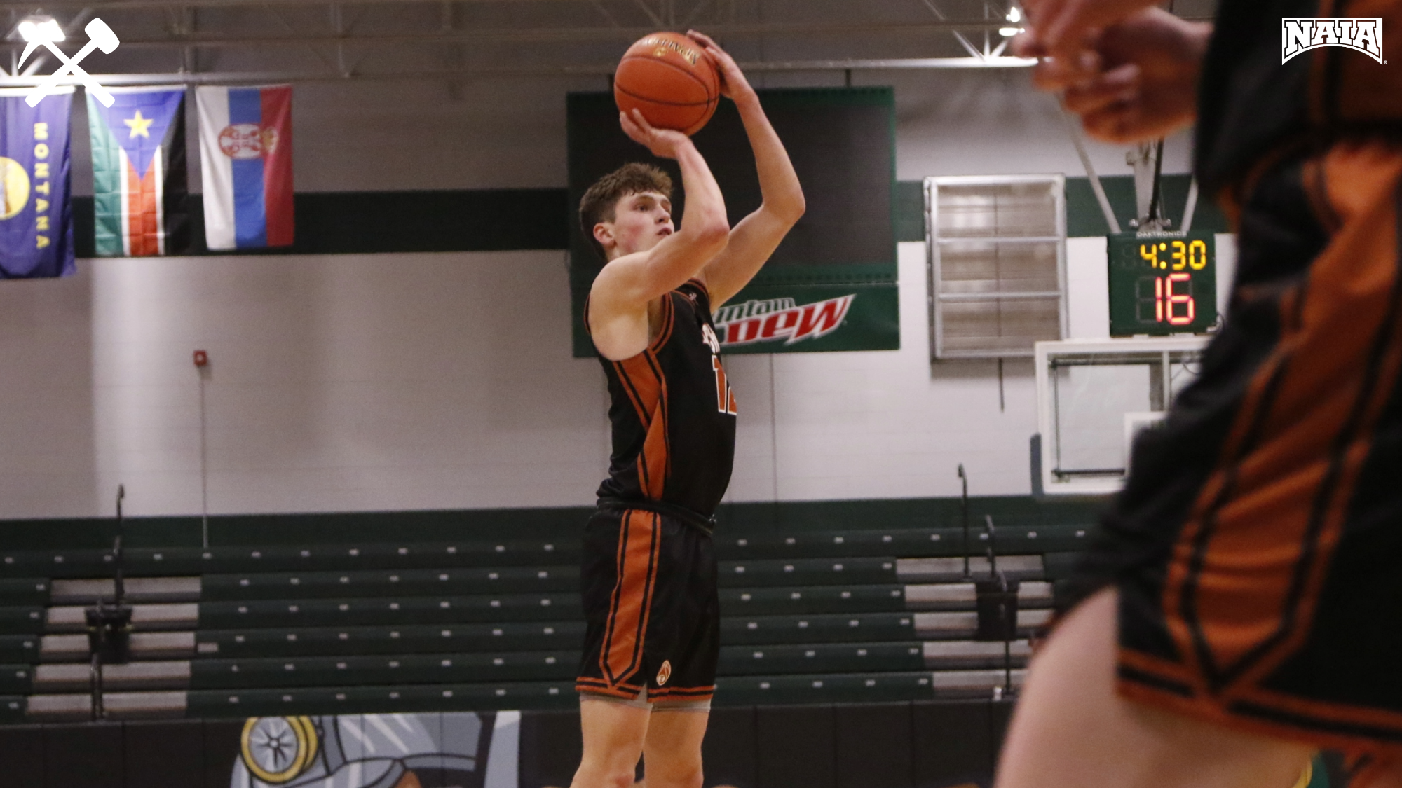 Asher Williams shoots a jump shot during a Montana Tech home basketball game