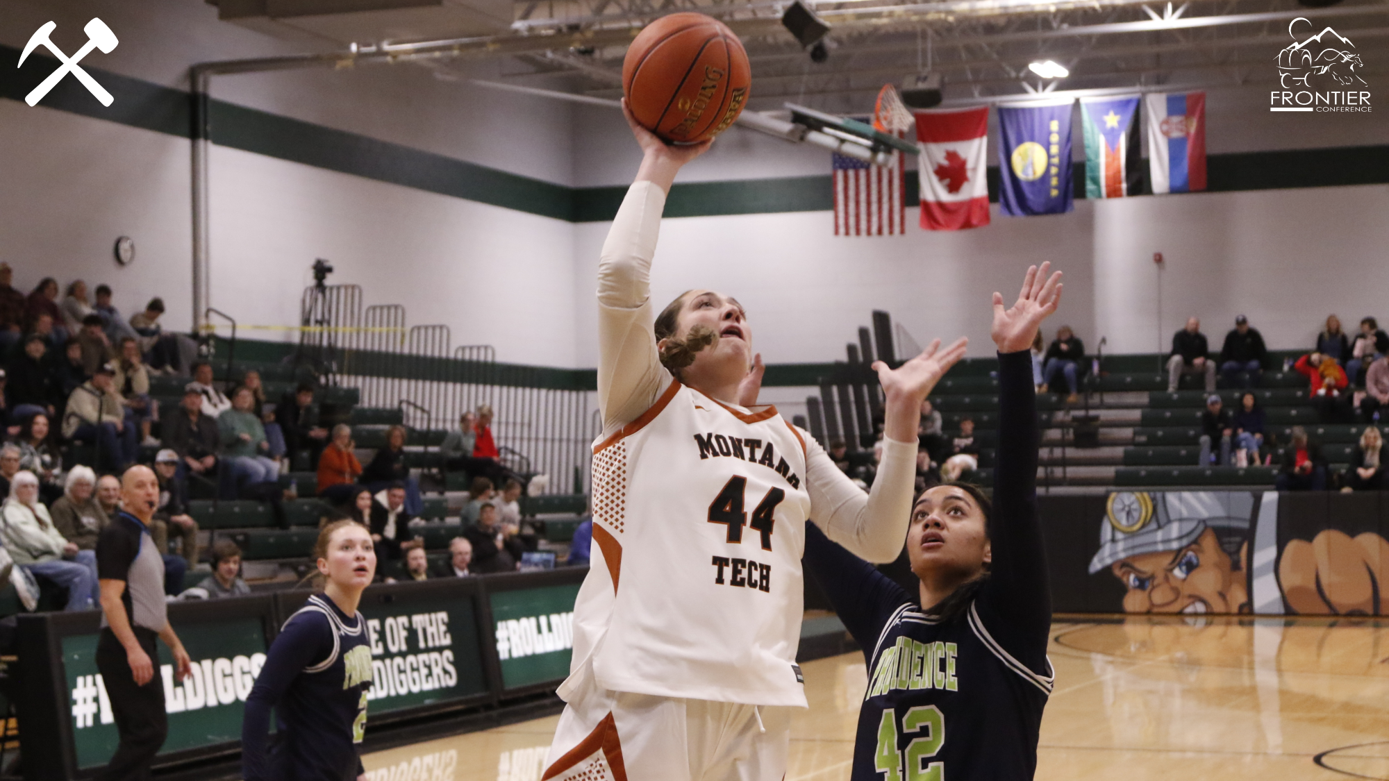 Hadley Humpherys shoots a layup during a Montana Tech women's basketball home game