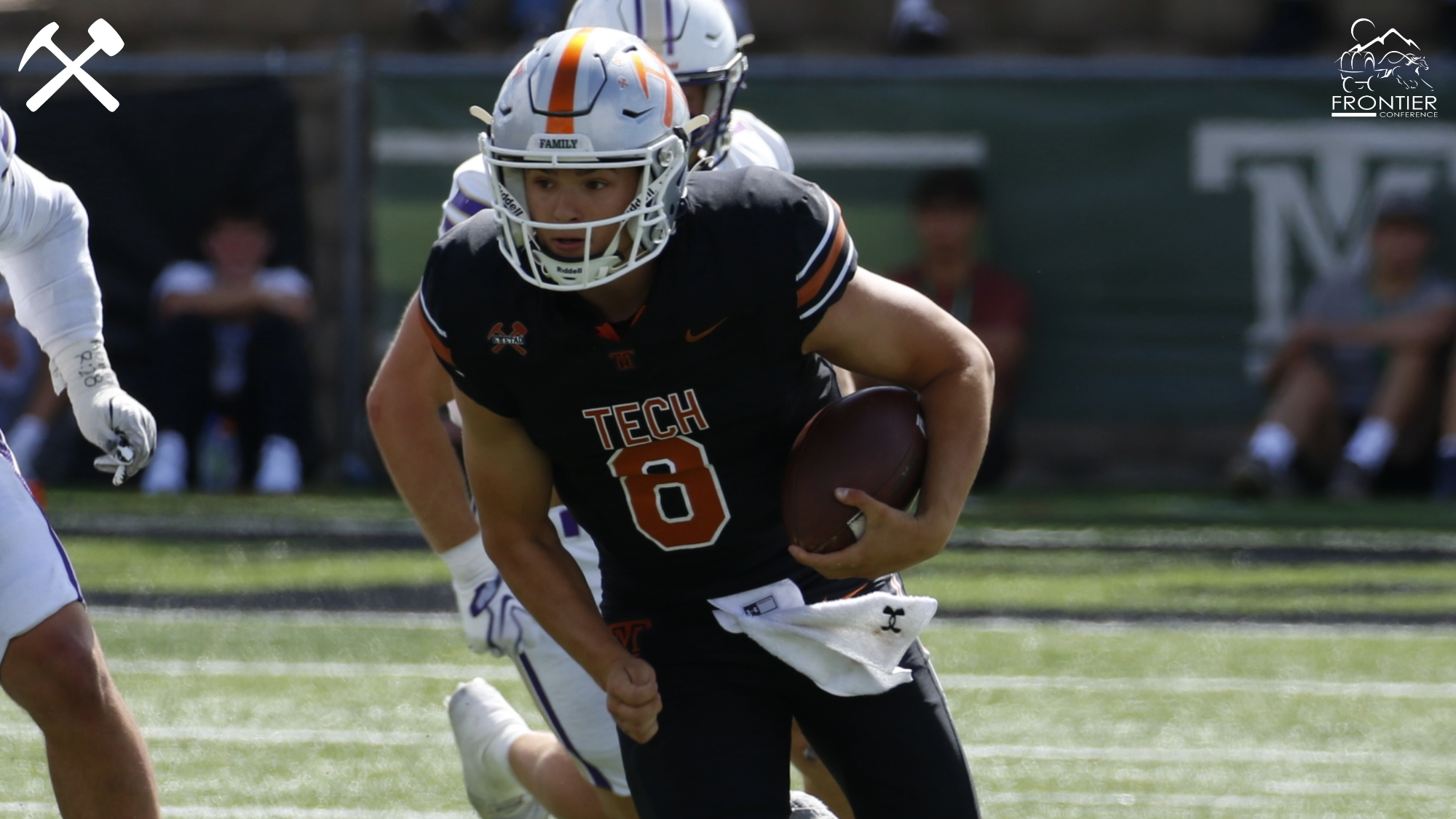 Jarrett Wilson running with the football