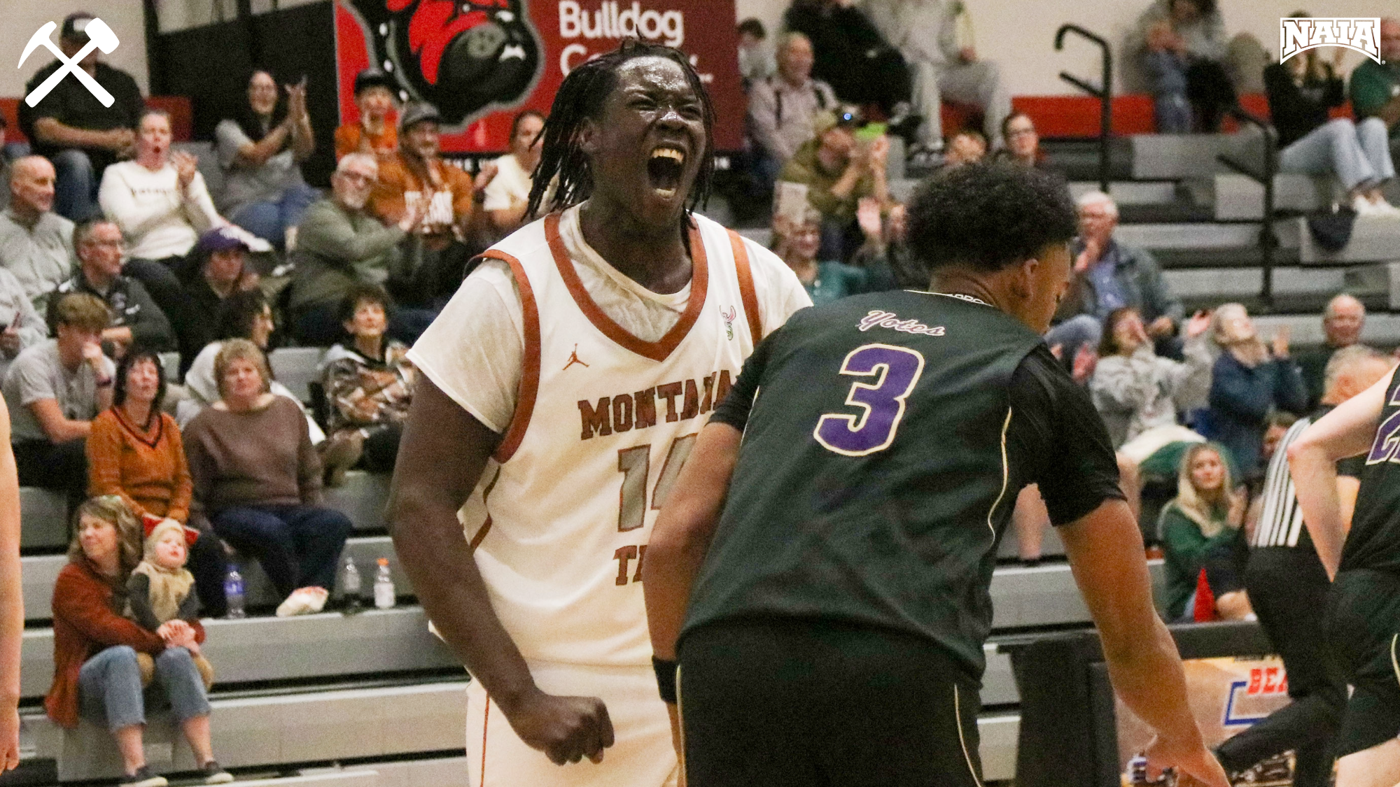 Justin Asi celebrates a basket in a Montana Tech men's basketball game