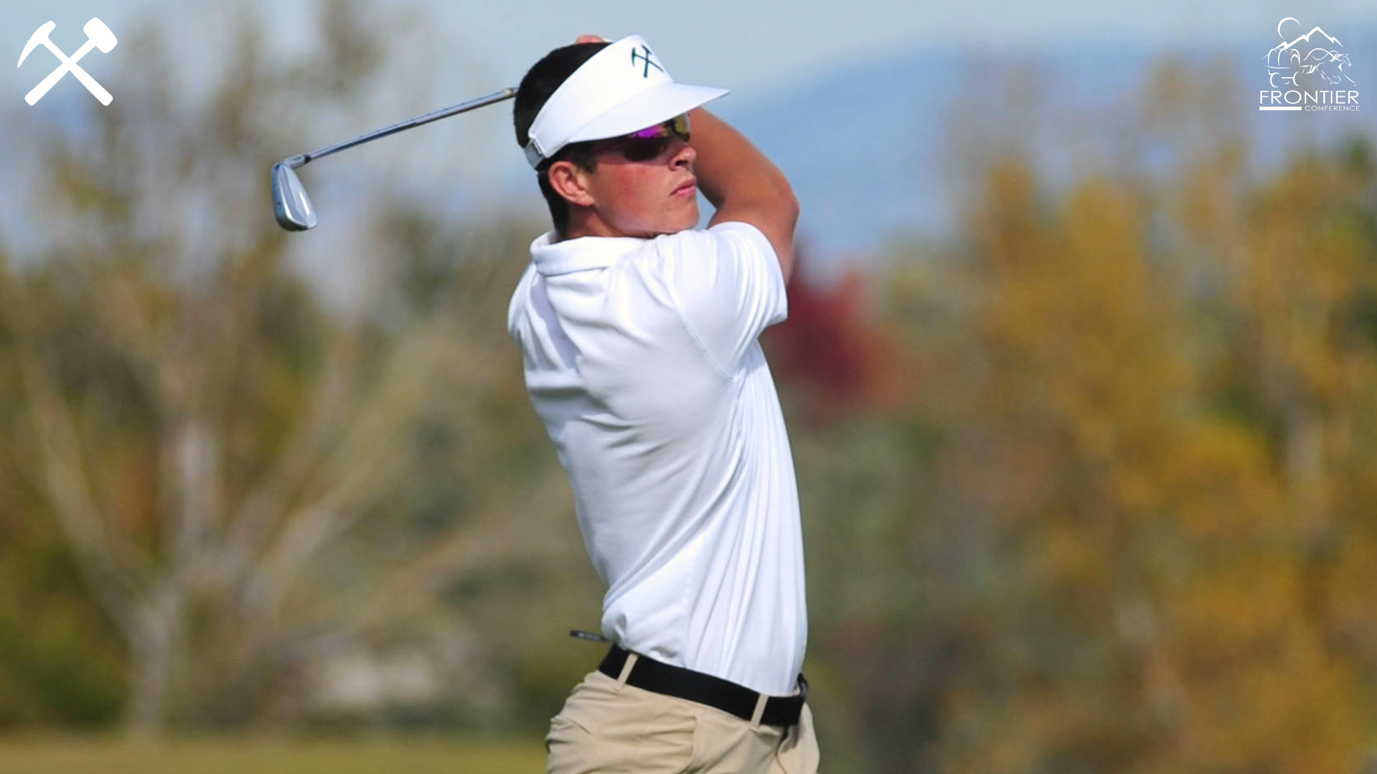 Tyler Avery watches a golf shot
