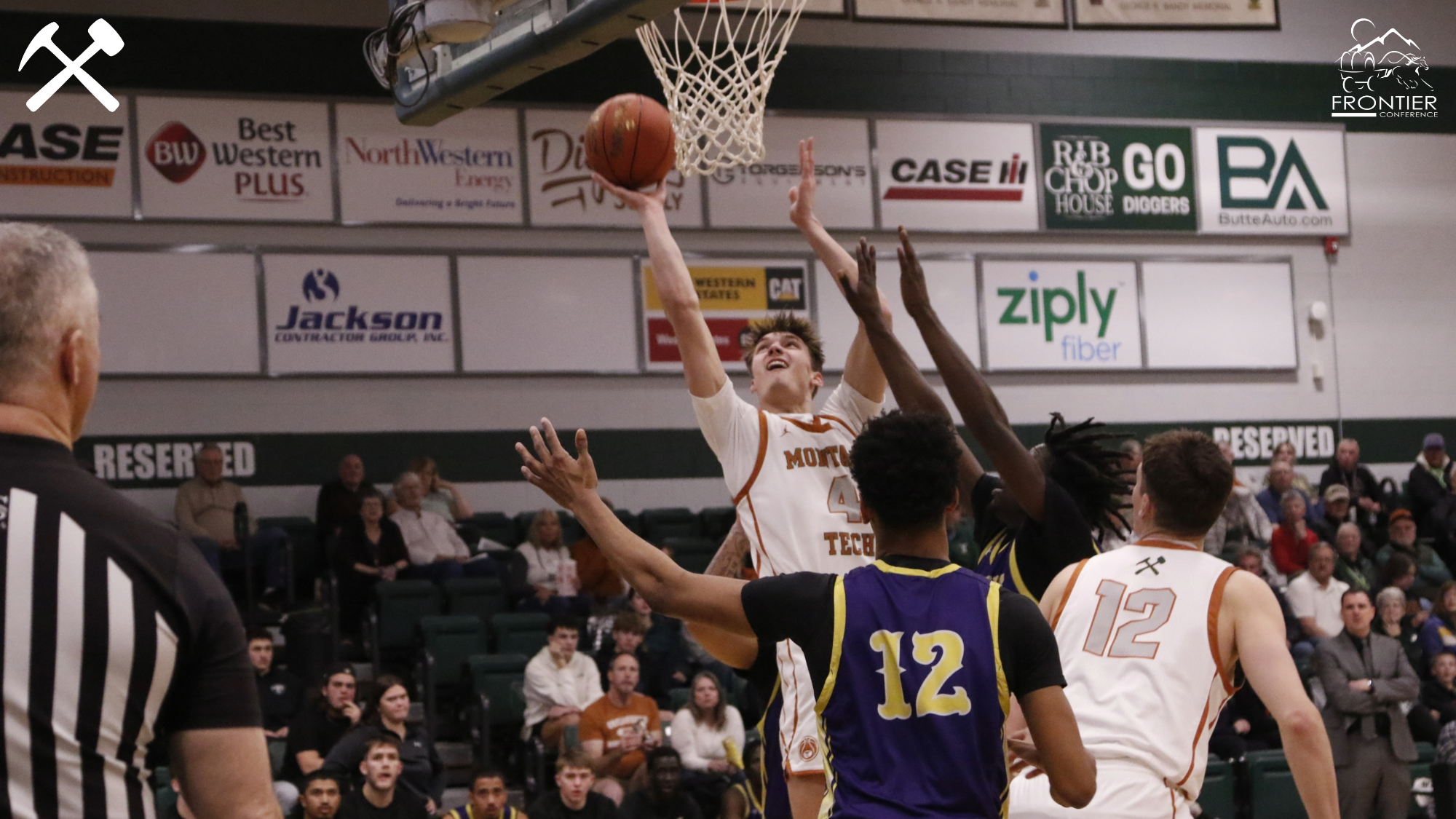 Ethan Venema shoots the ball during a Montana Tech home men's basketball game
