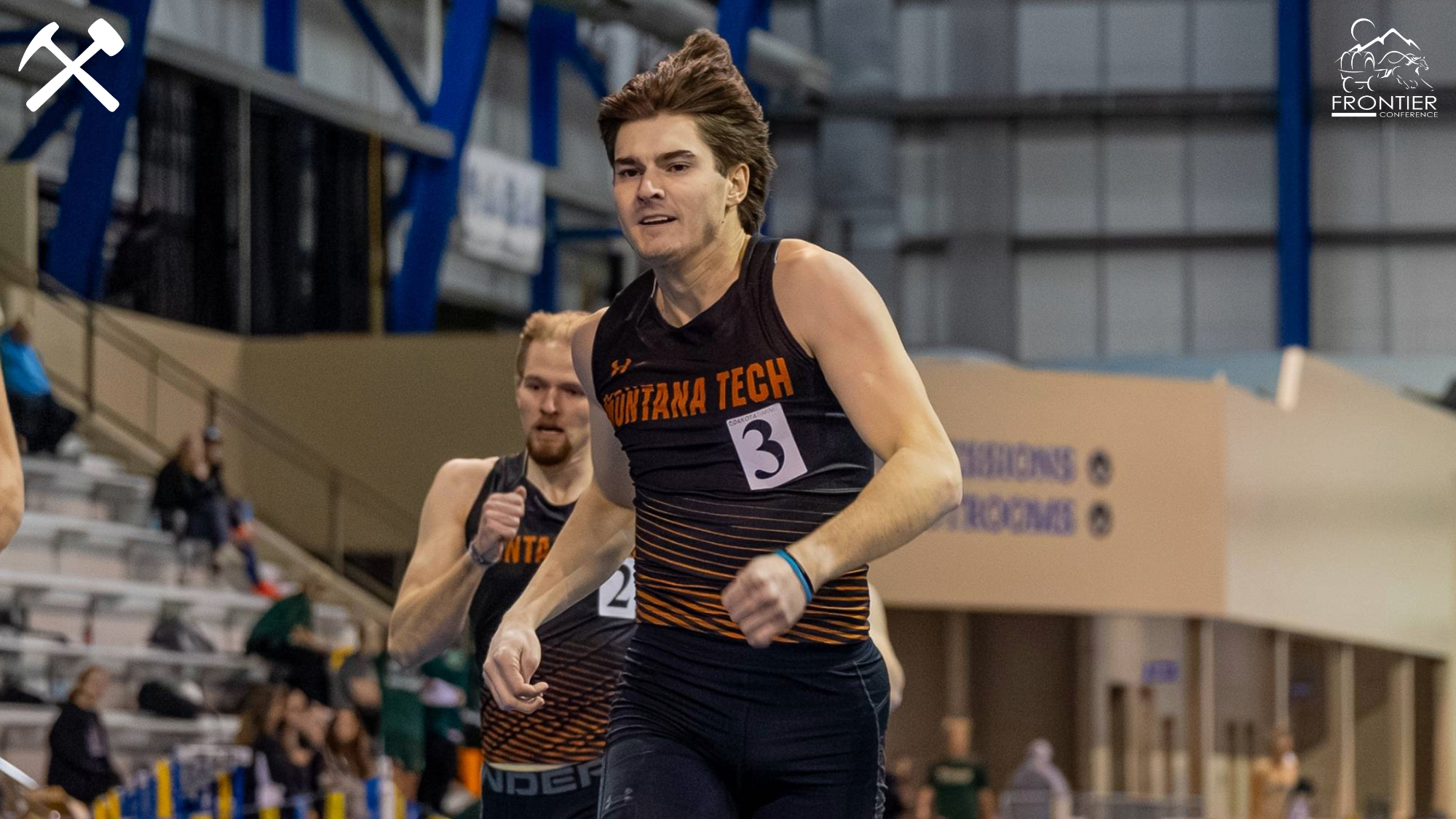 Konnor Gregerson running in an indoor track meet