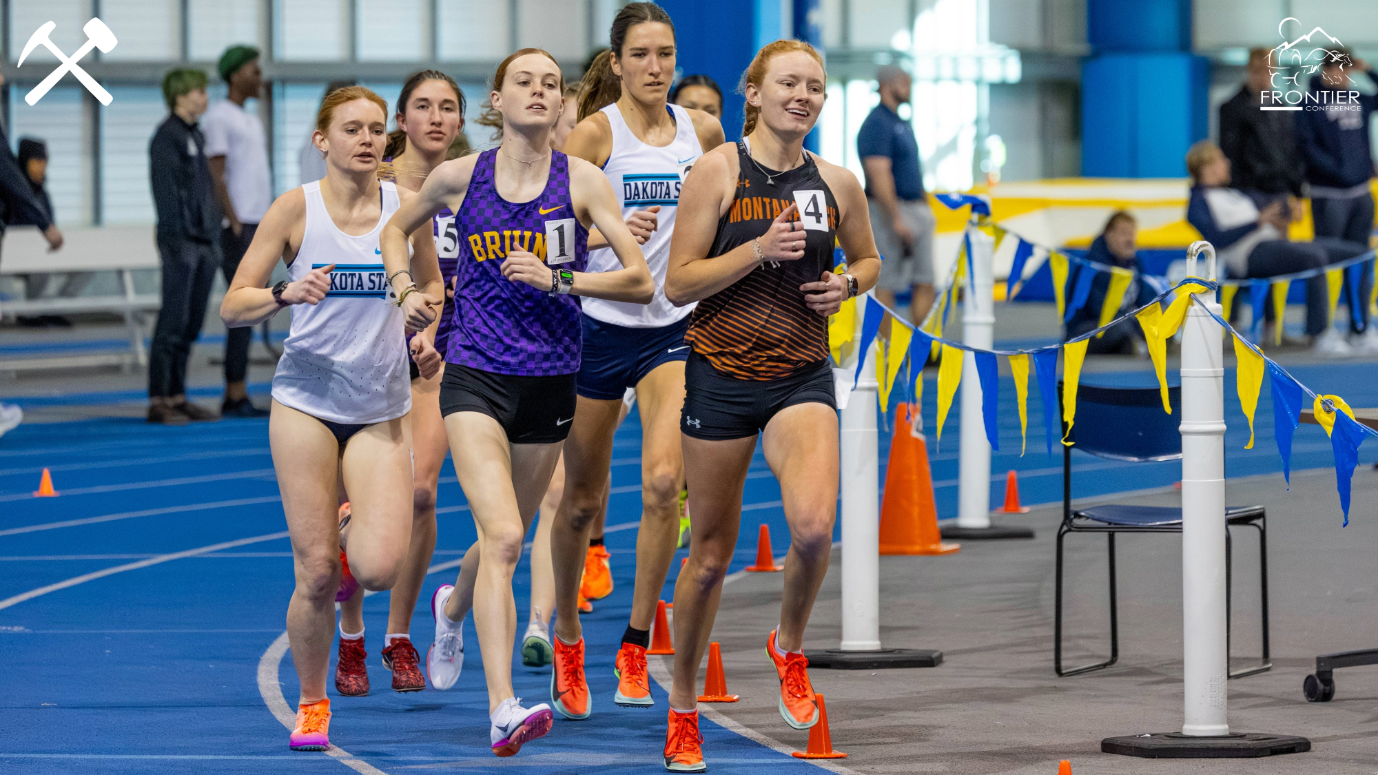 Montana Tech's Alyssa Jany leads a pack of runners during an indoor track race