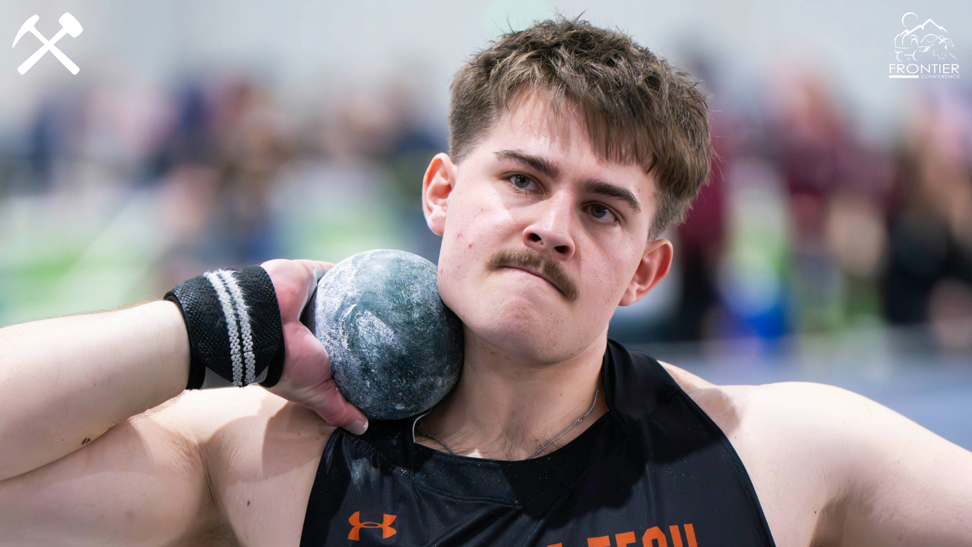 Cade VanVleet prepares to throw a shot put at a Montana Tech track meet