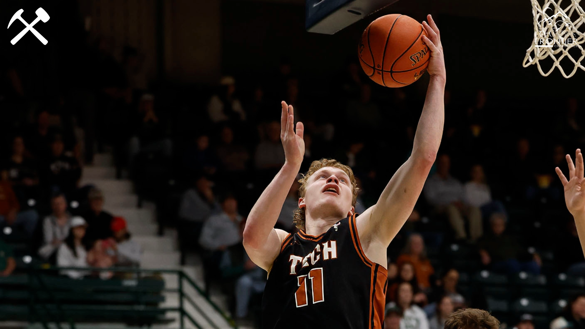 Hayden Diekhans makes a layup for the Montana Tech men's basketball team
