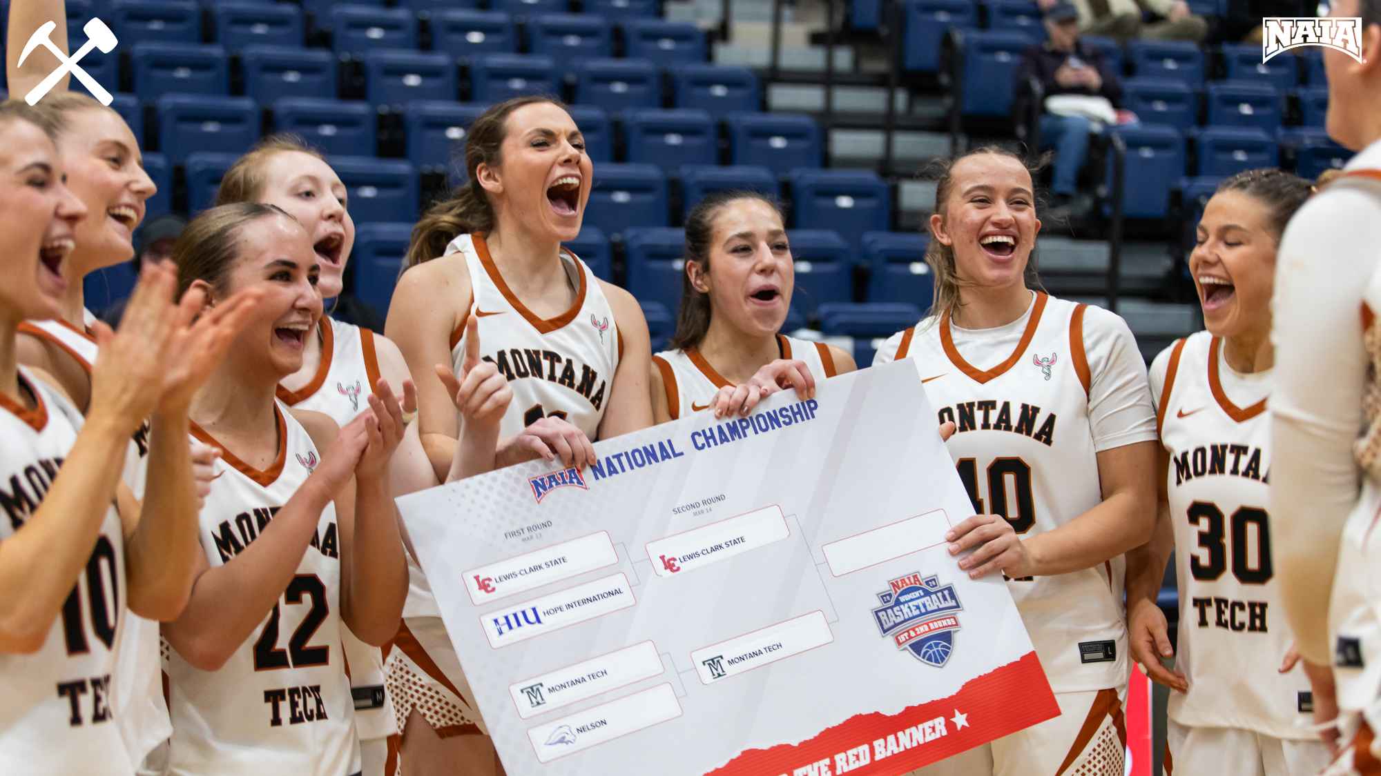 Montana Tech women's basketball players celebrate an NAIA tournament win