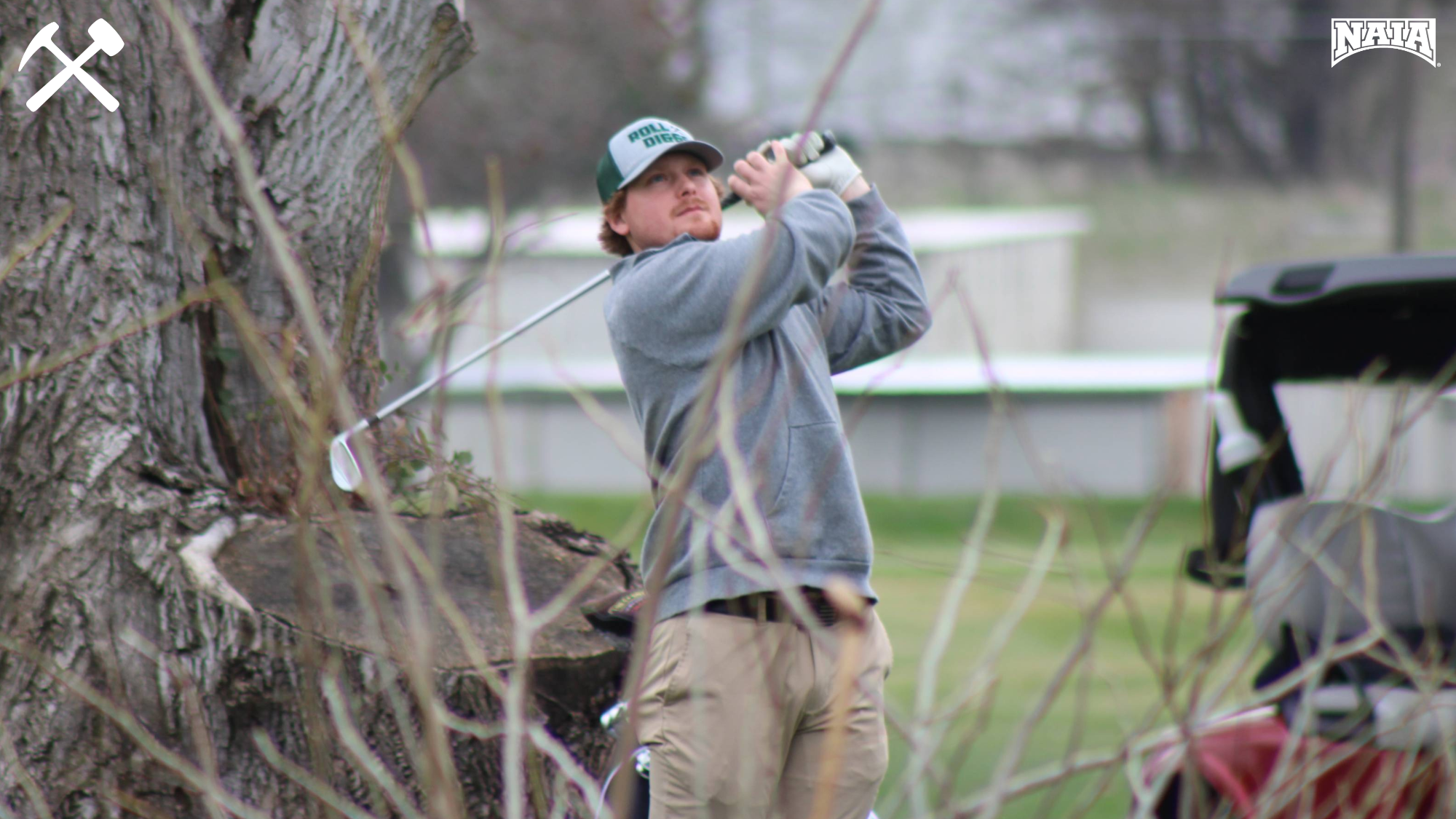 Colin Wade watches a golf shot fly during a tournament