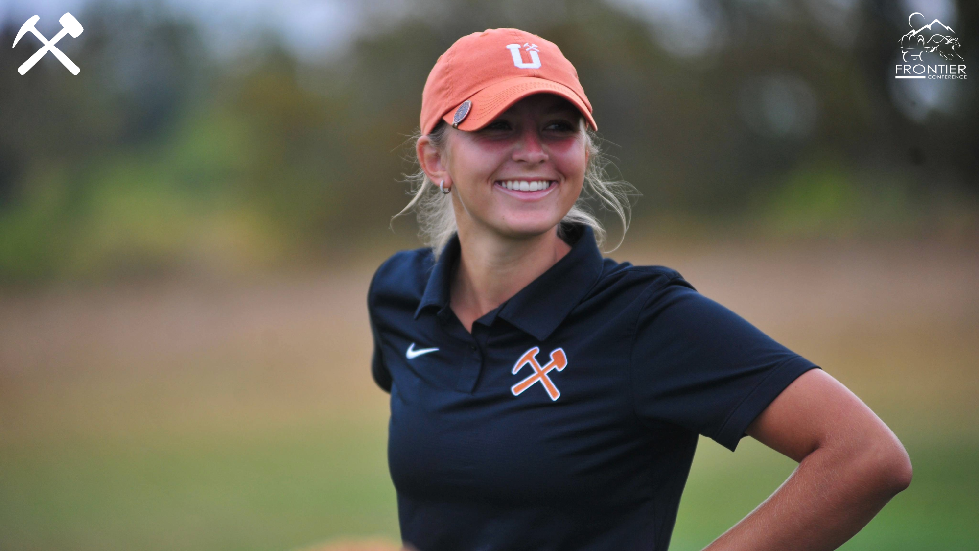 Kodie Hoagland smiles during a golf round