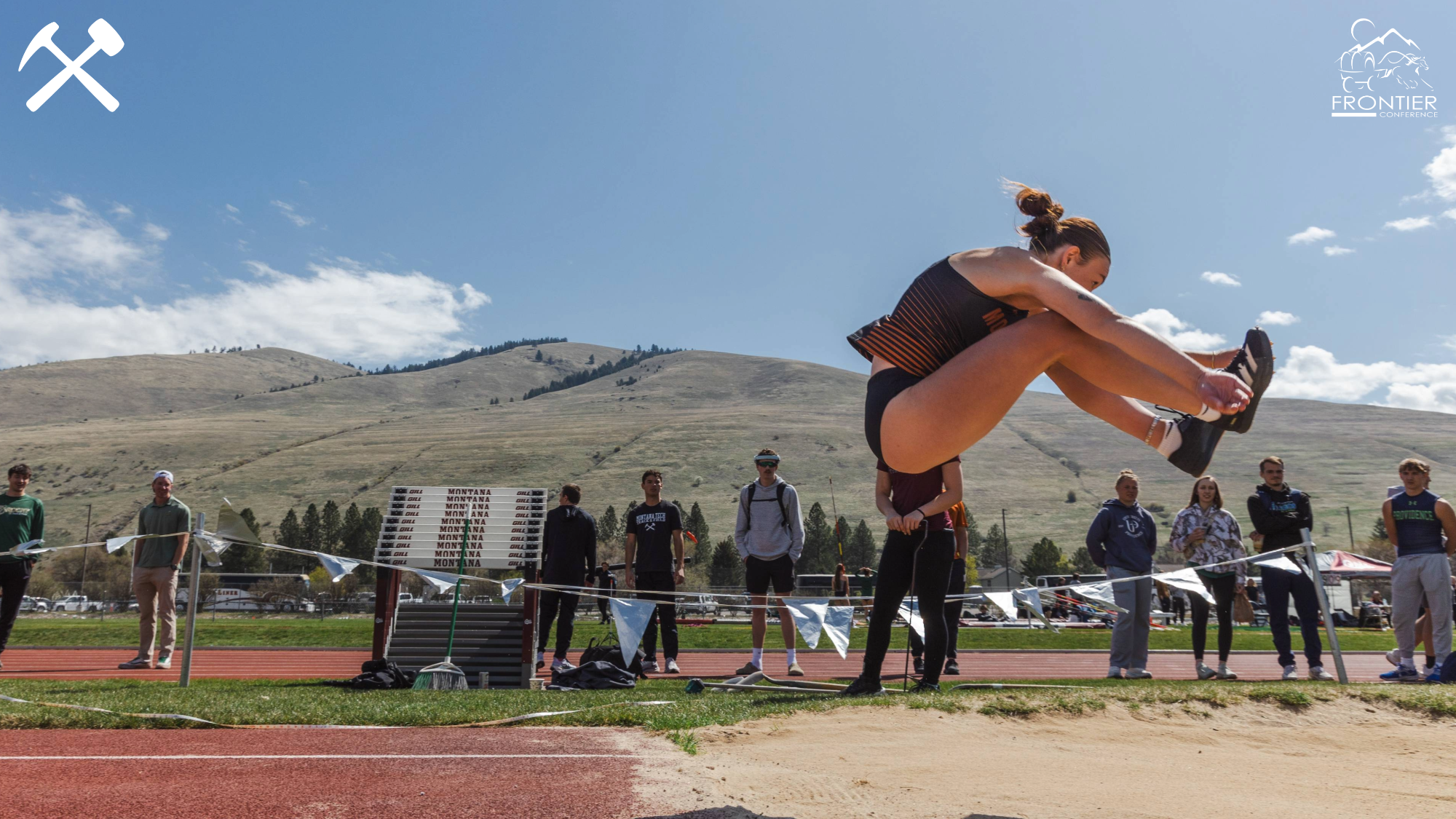 Jadyn Vermillion long jumps in a track & field meet