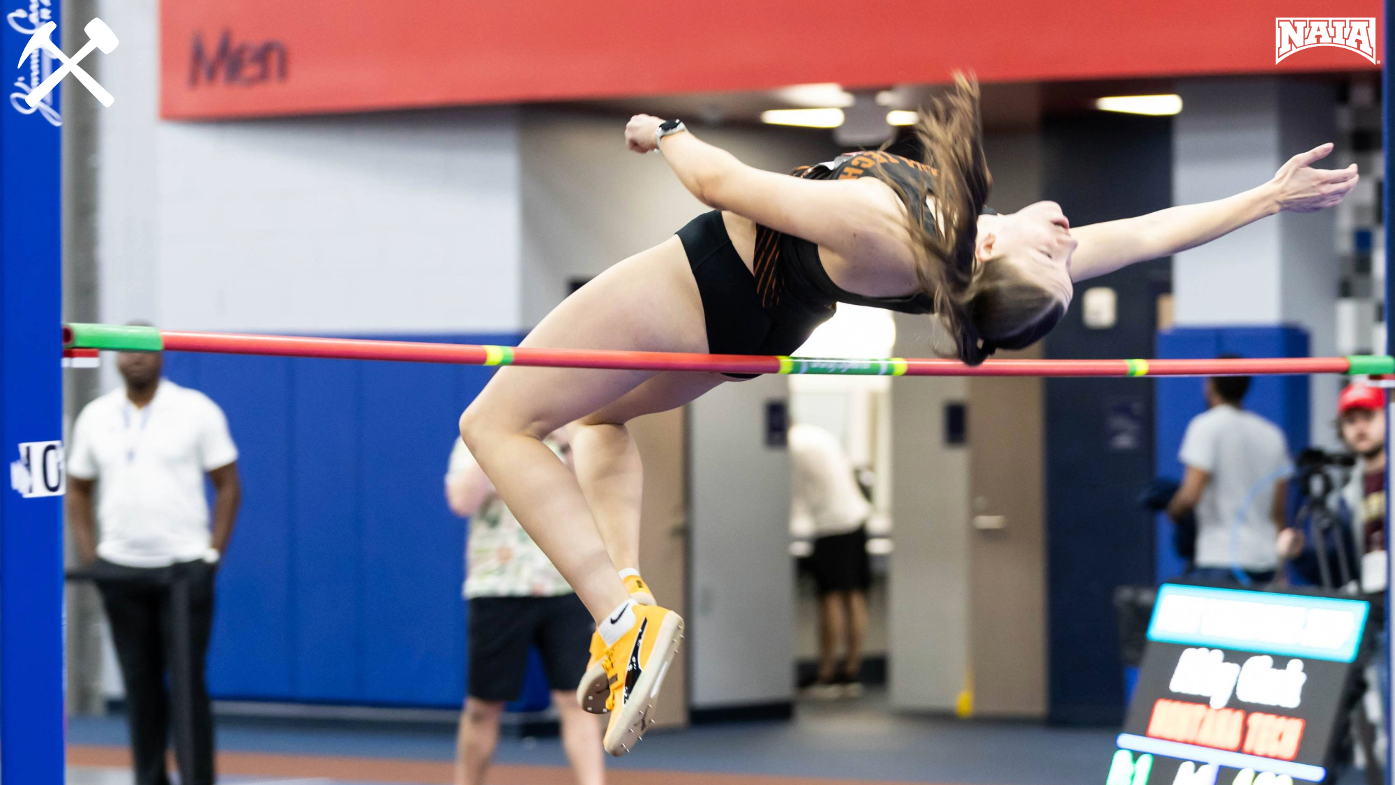 Abby Clark clears the high jump bar during the pentathlon
