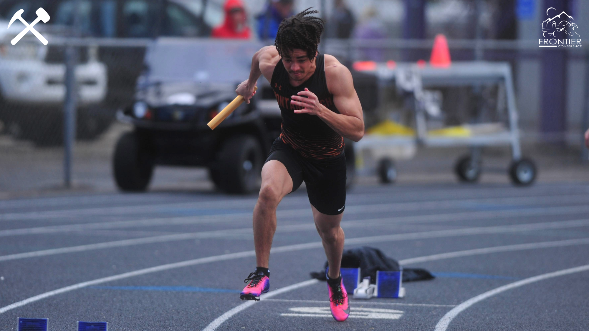 Jaxon Allery starts on a Montana Tech track relay