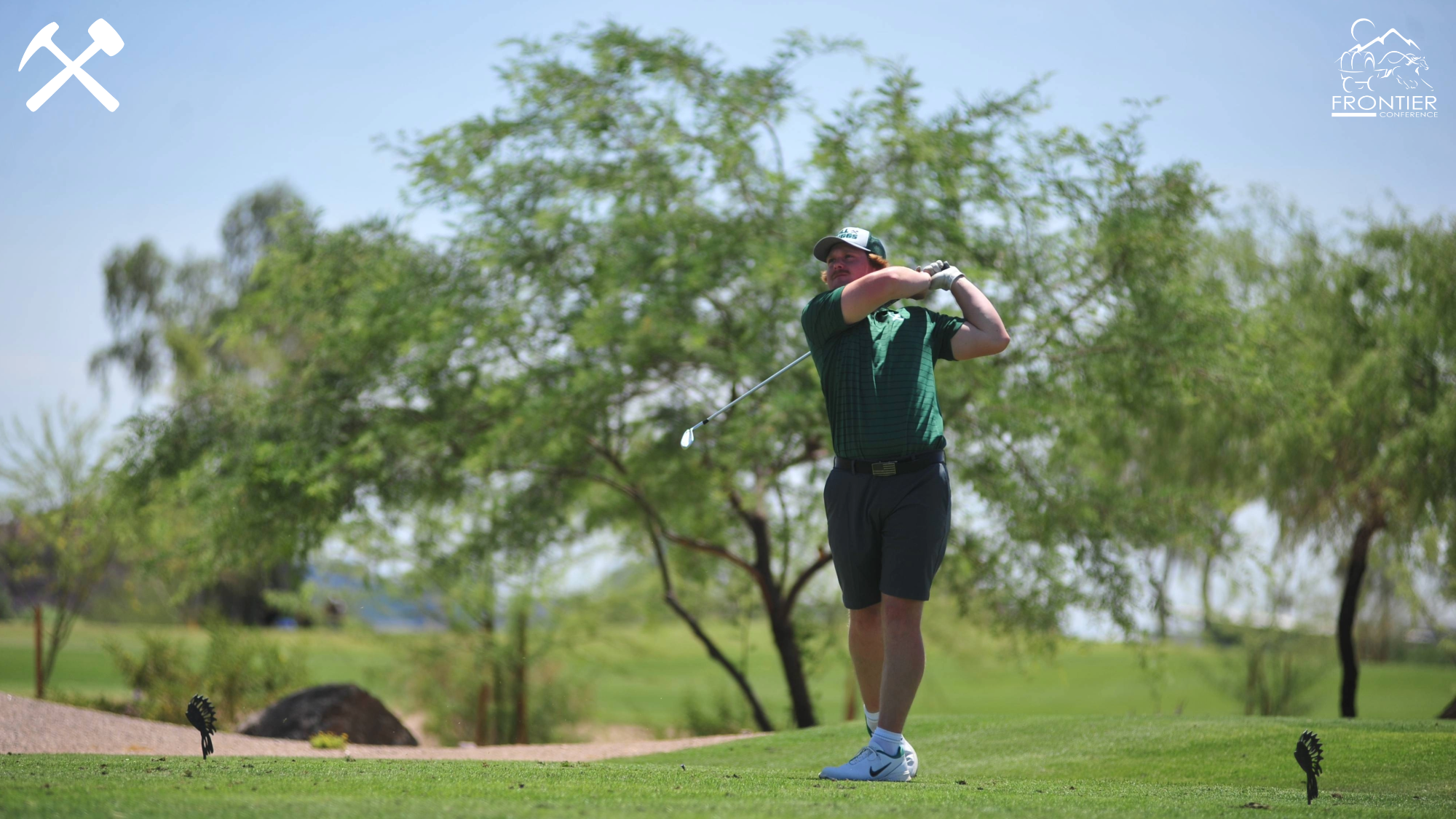 Colin Wade watches a golf shot fly after teeing off during a Montana Tech tournament