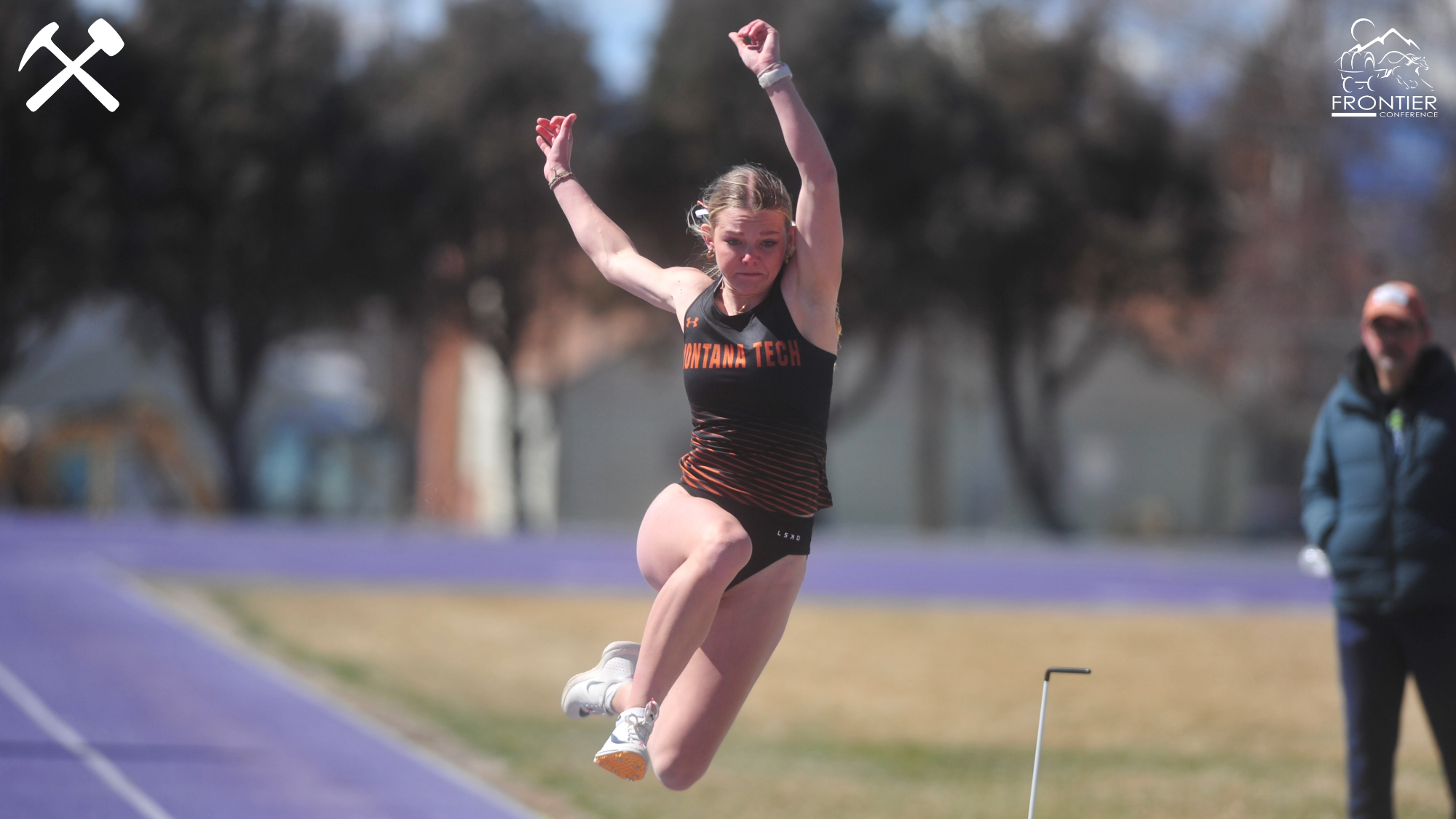 Ayla Janzen jumps in the long jump at a Montana Tech track meet