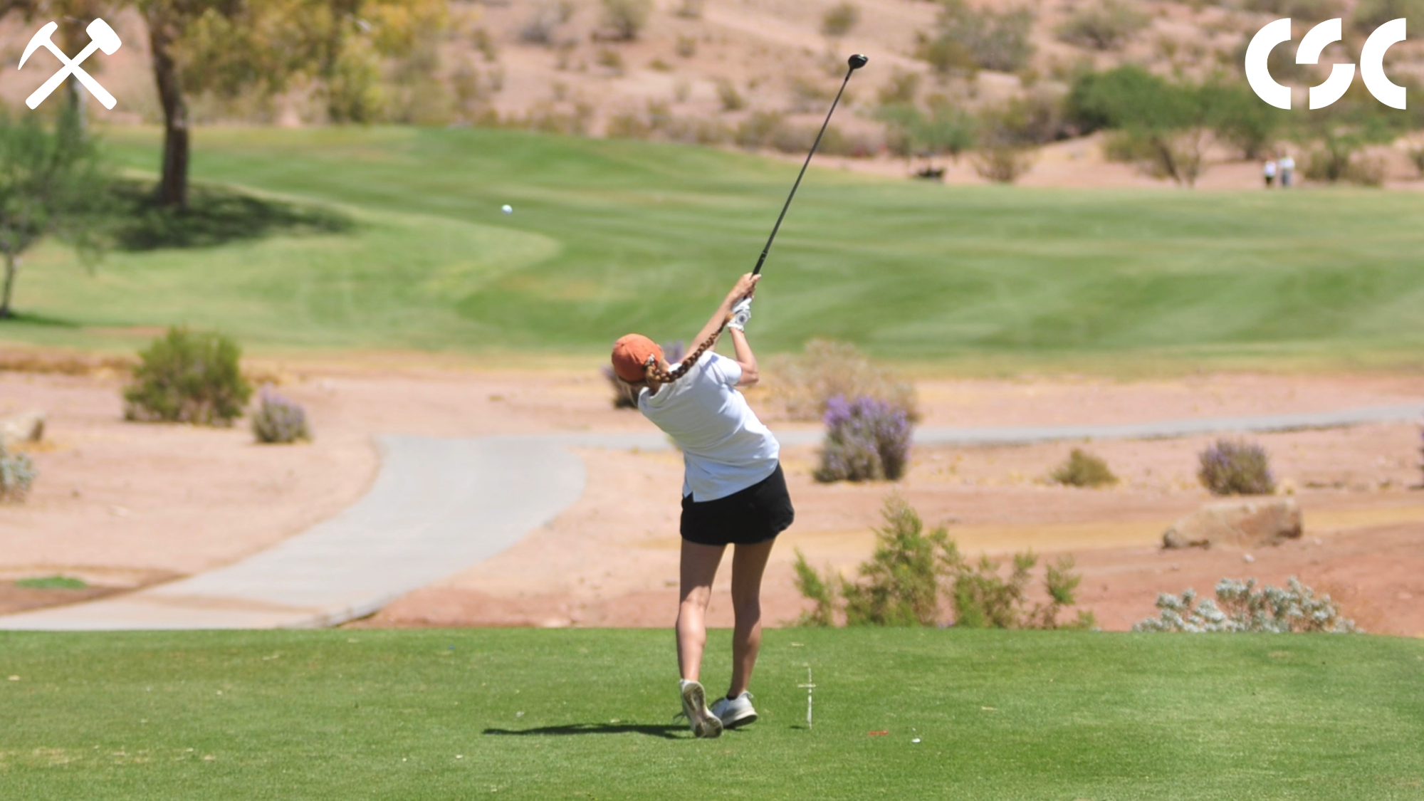 Kodie Hoagland hits a drive during a women's golf tournament