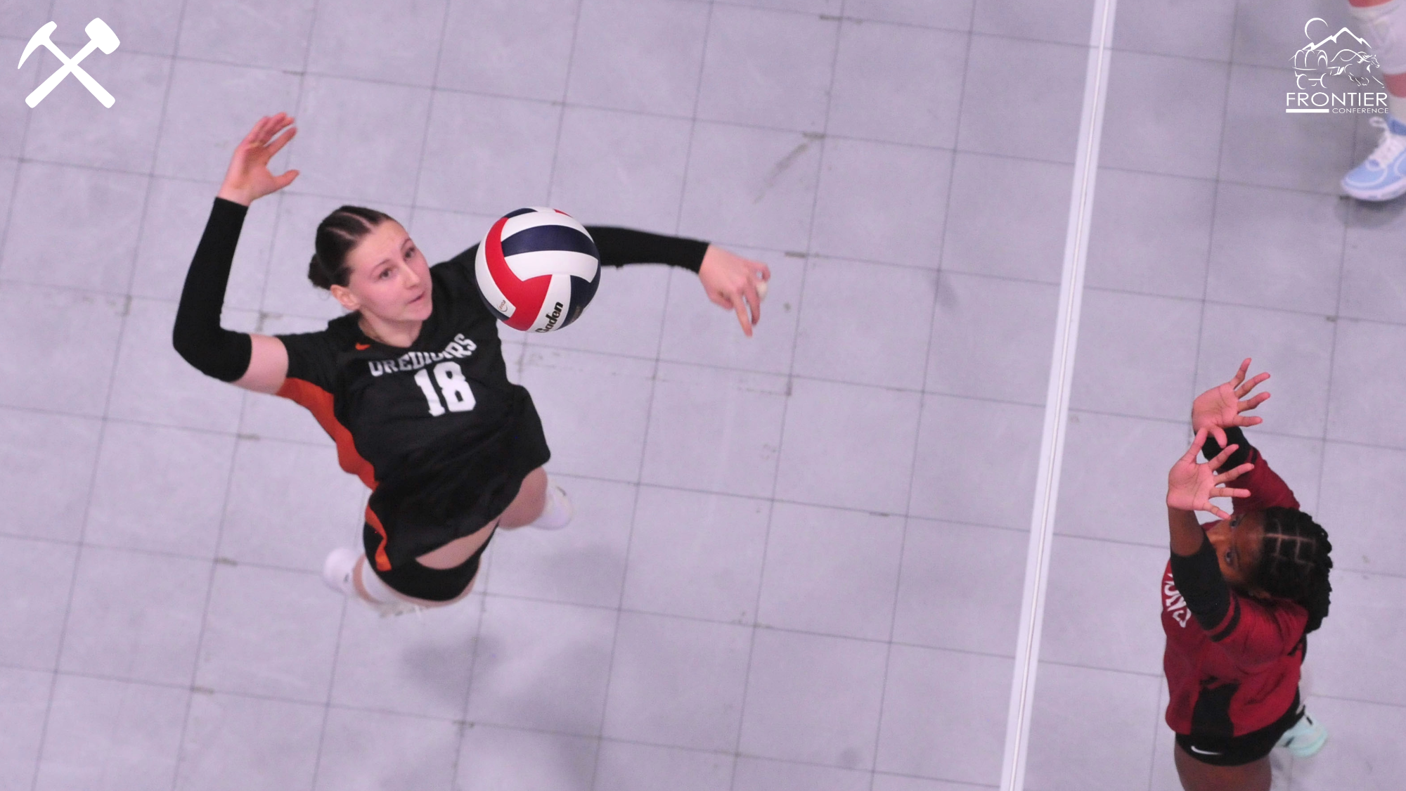 Madison Biery hits the volleyball during a Montana Tech match