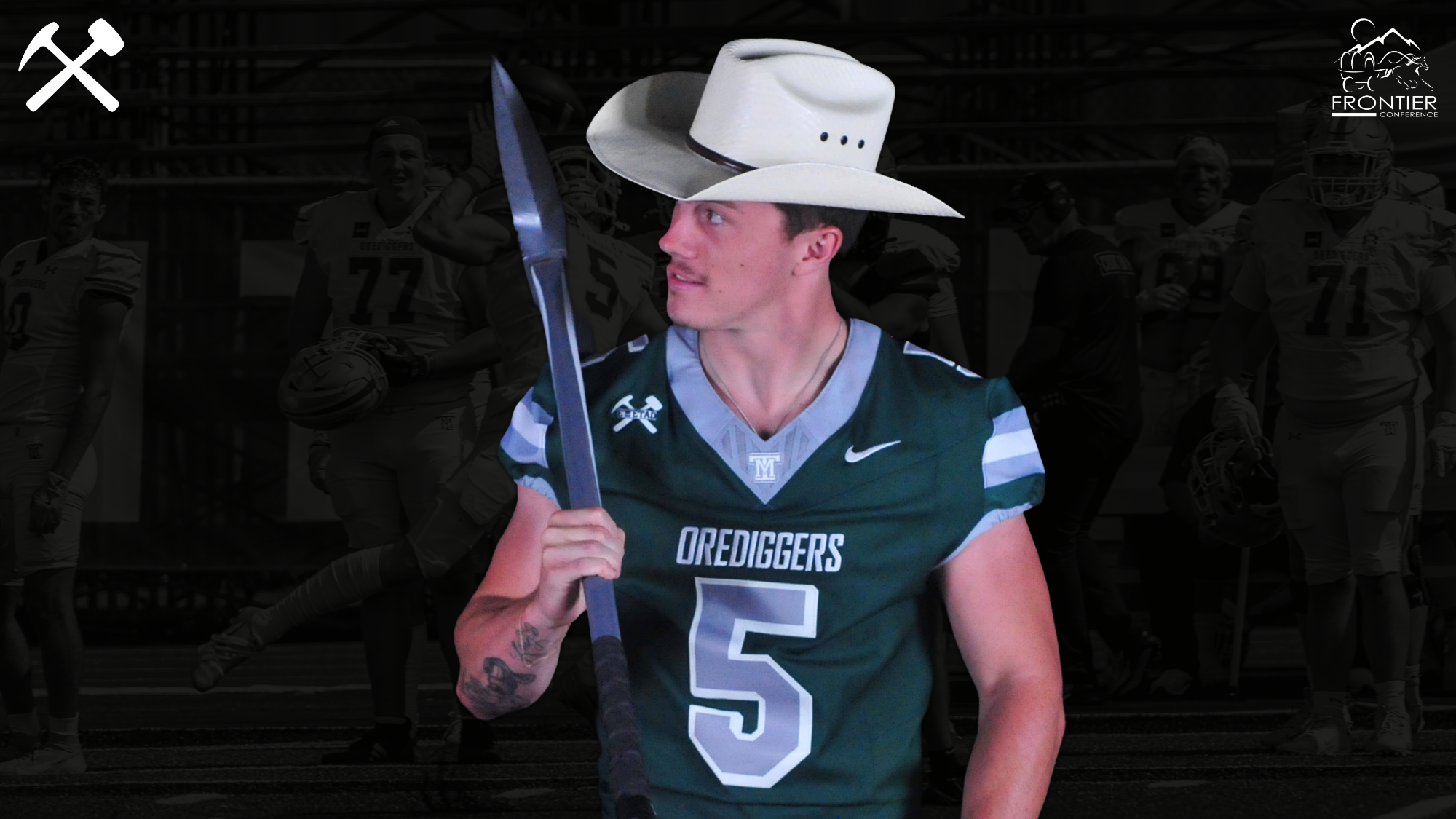 Christian Hansen wearing a cowboy had and holding a pickaxe