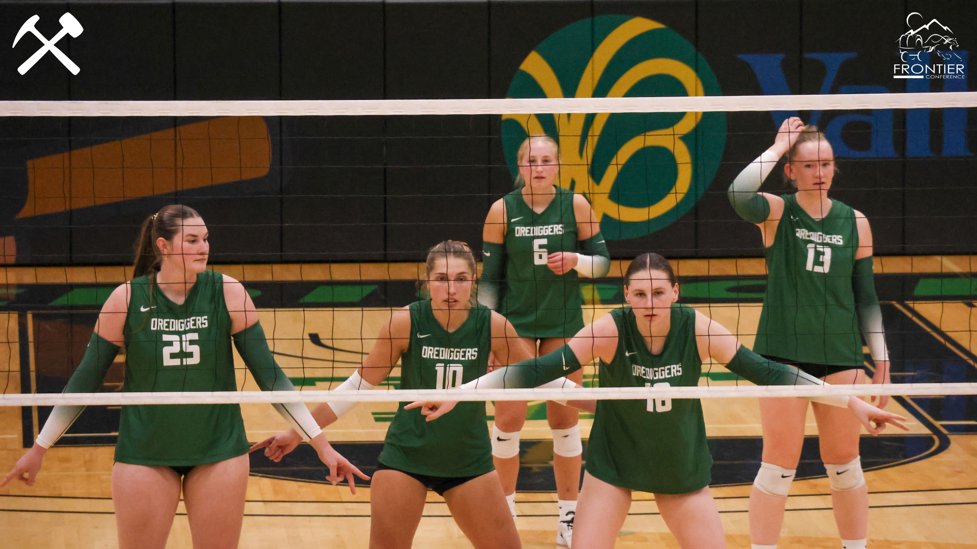 Montana Tech's volleyball team prepares to receive a serve