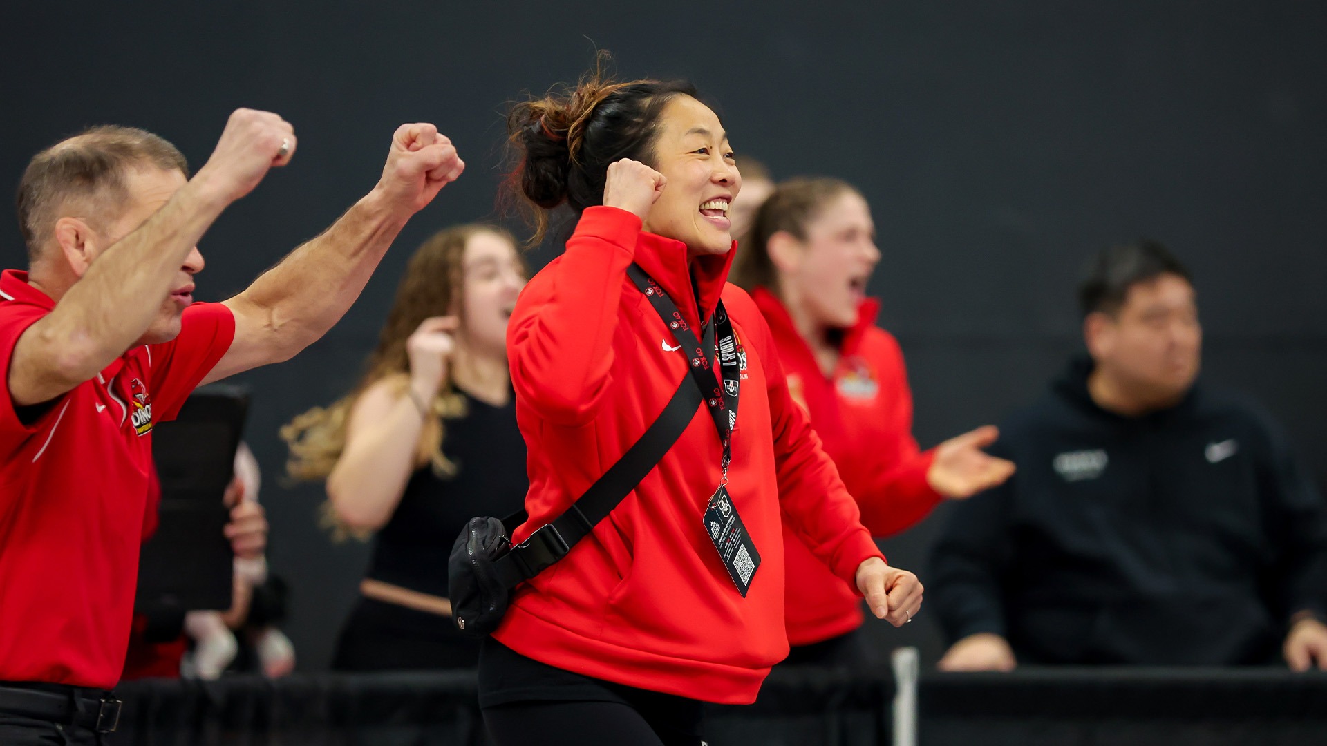 Carol Huynh, coach, celebration