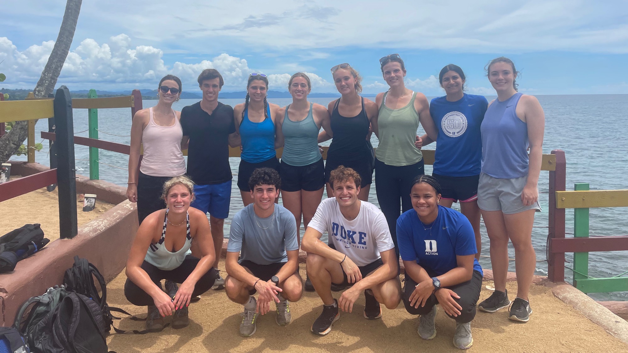 The 2024 ACE Program in Costa Rica gathers for a photo in front of beautiful water