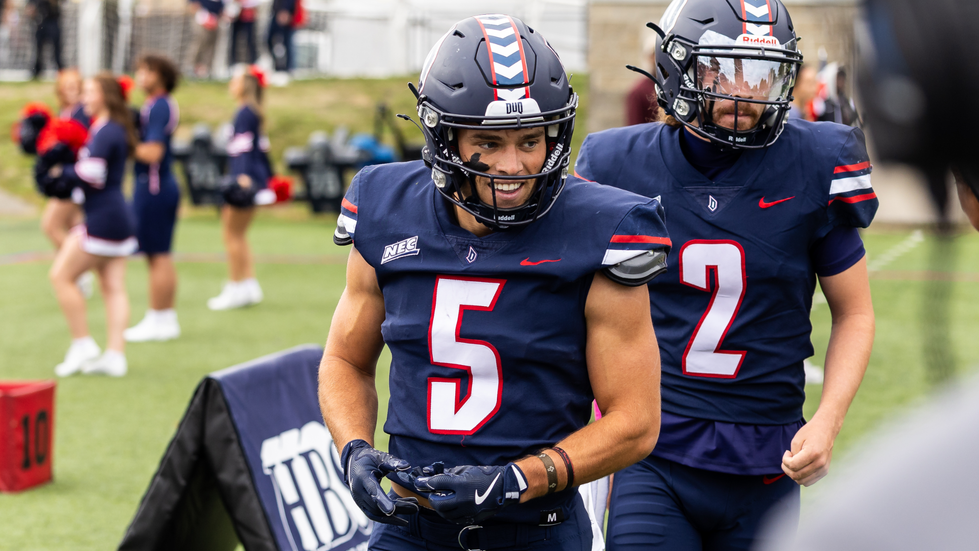 isabella smiles on sideline vs. saint francis