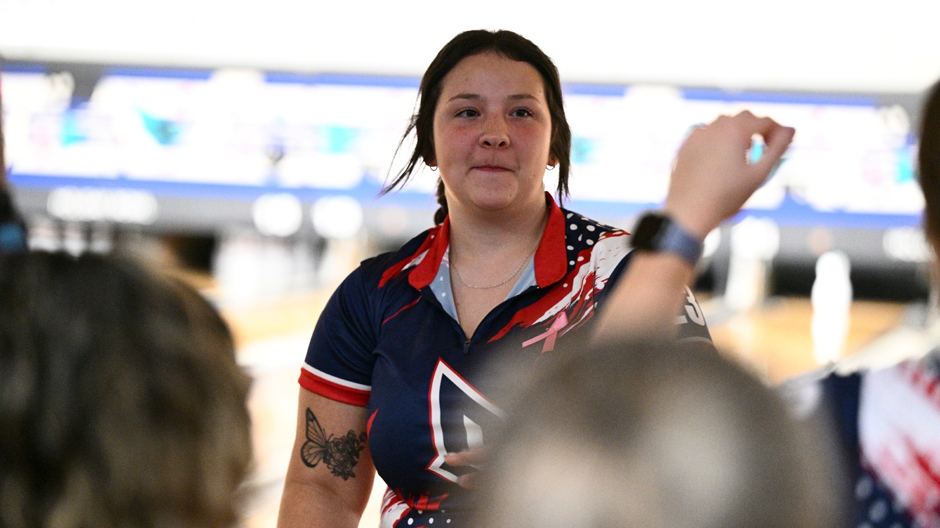 Taylor Miller celebrates with teammates at the Chelsea Gilliam Penguin Classic.