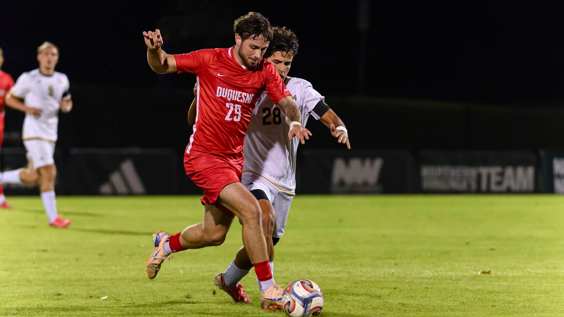 Roni Badler battles for possession at George Mason.