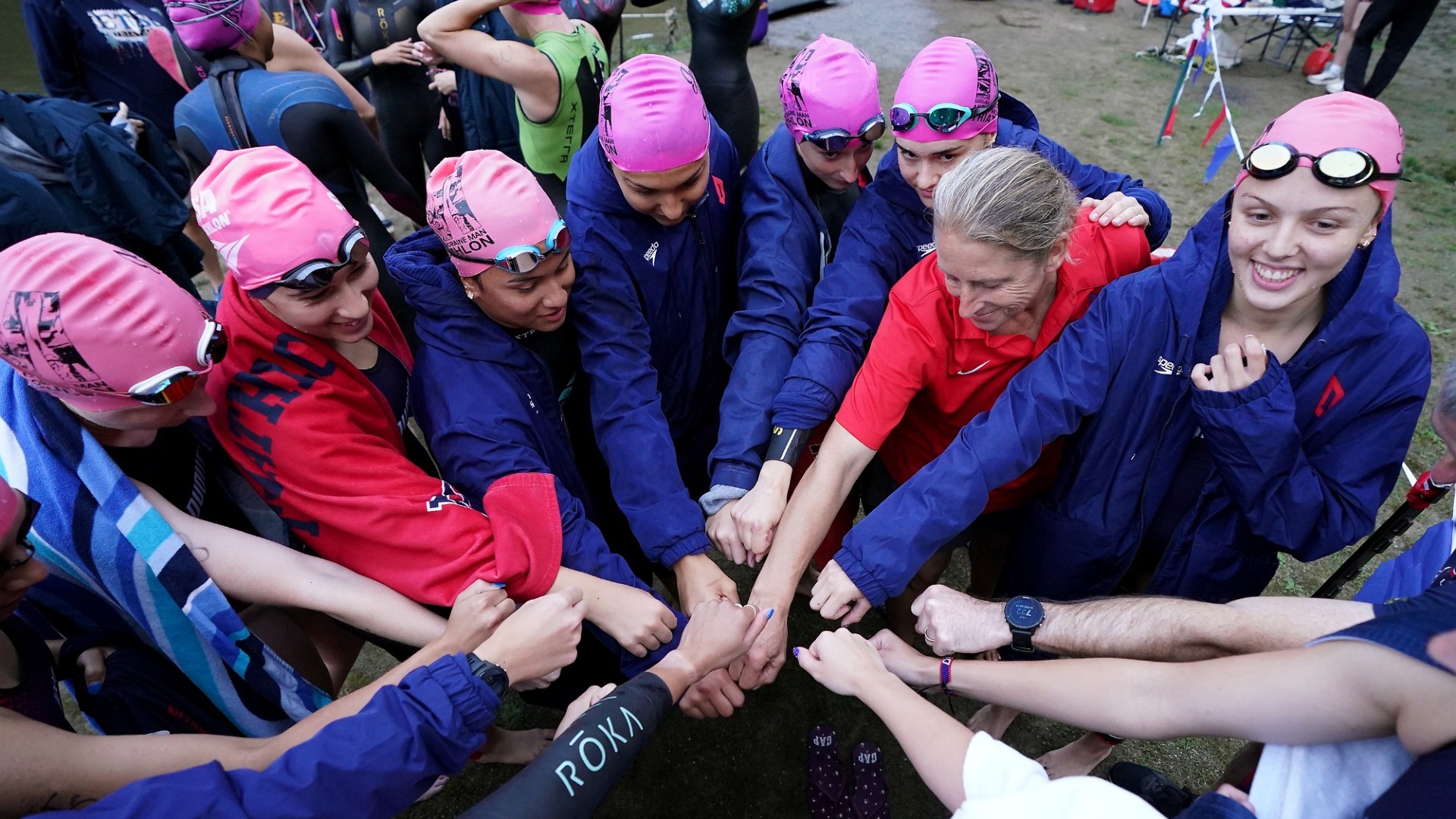 Triathlon team huddle before 2026 Duquesne Invitational