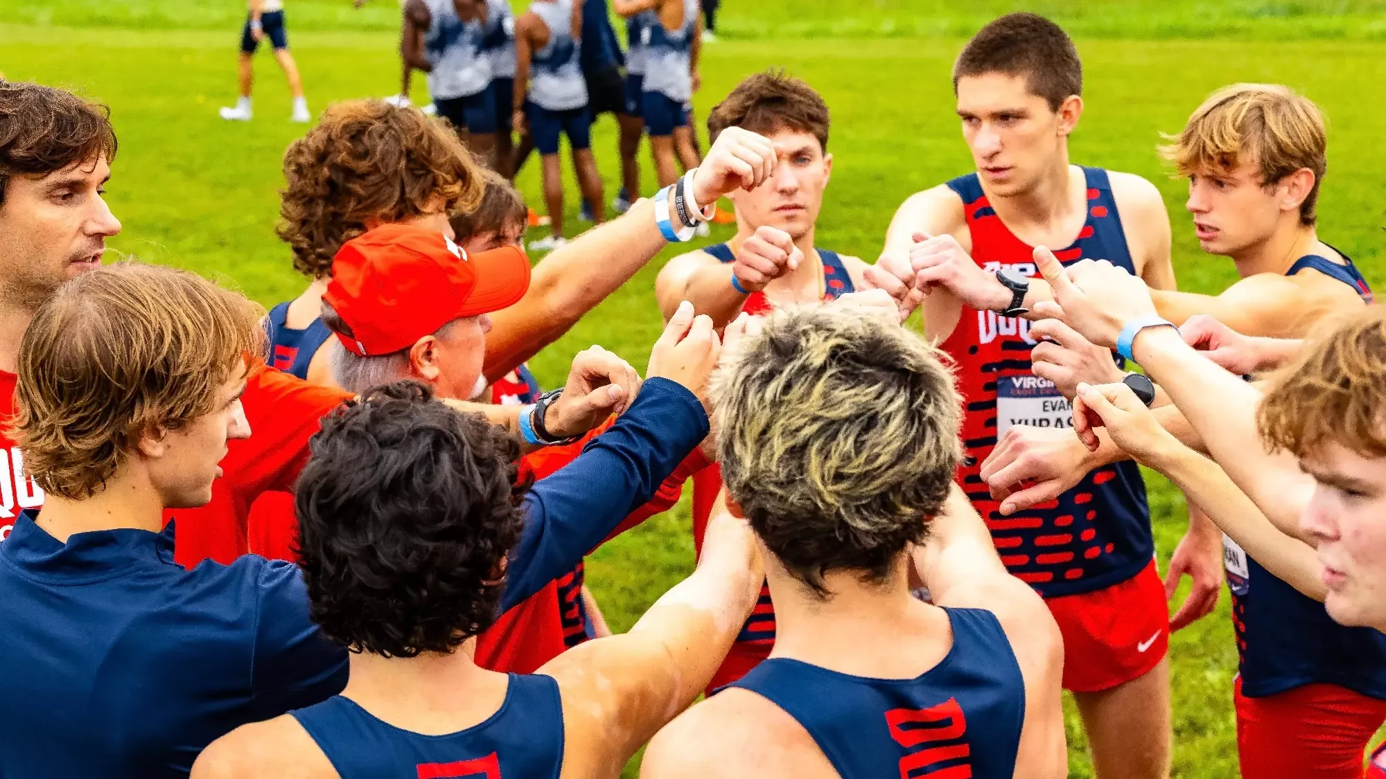 Men’s XC team huddle before UVA meet 2026