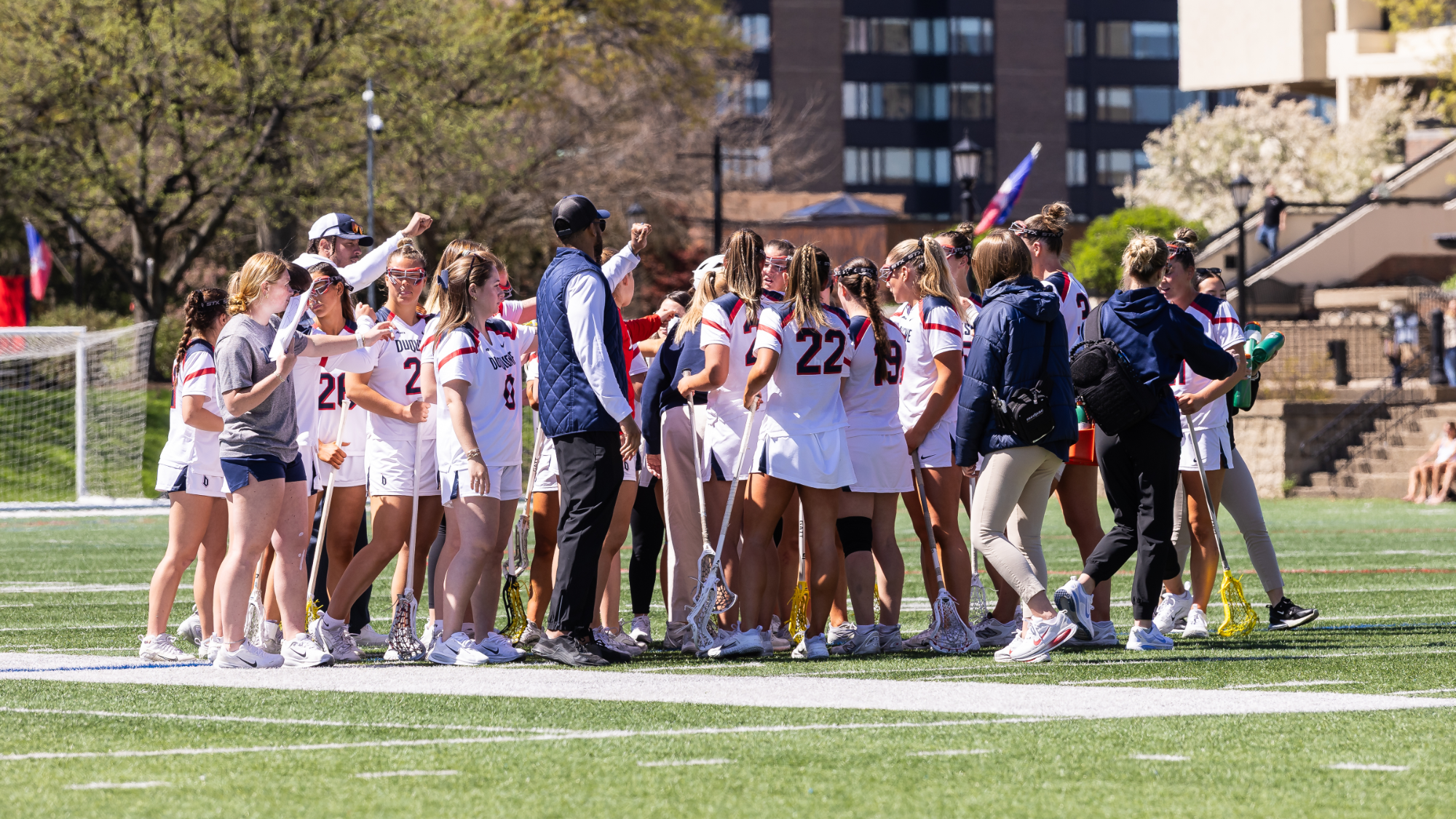 lax team huddle at 2026 game vs. la salle 