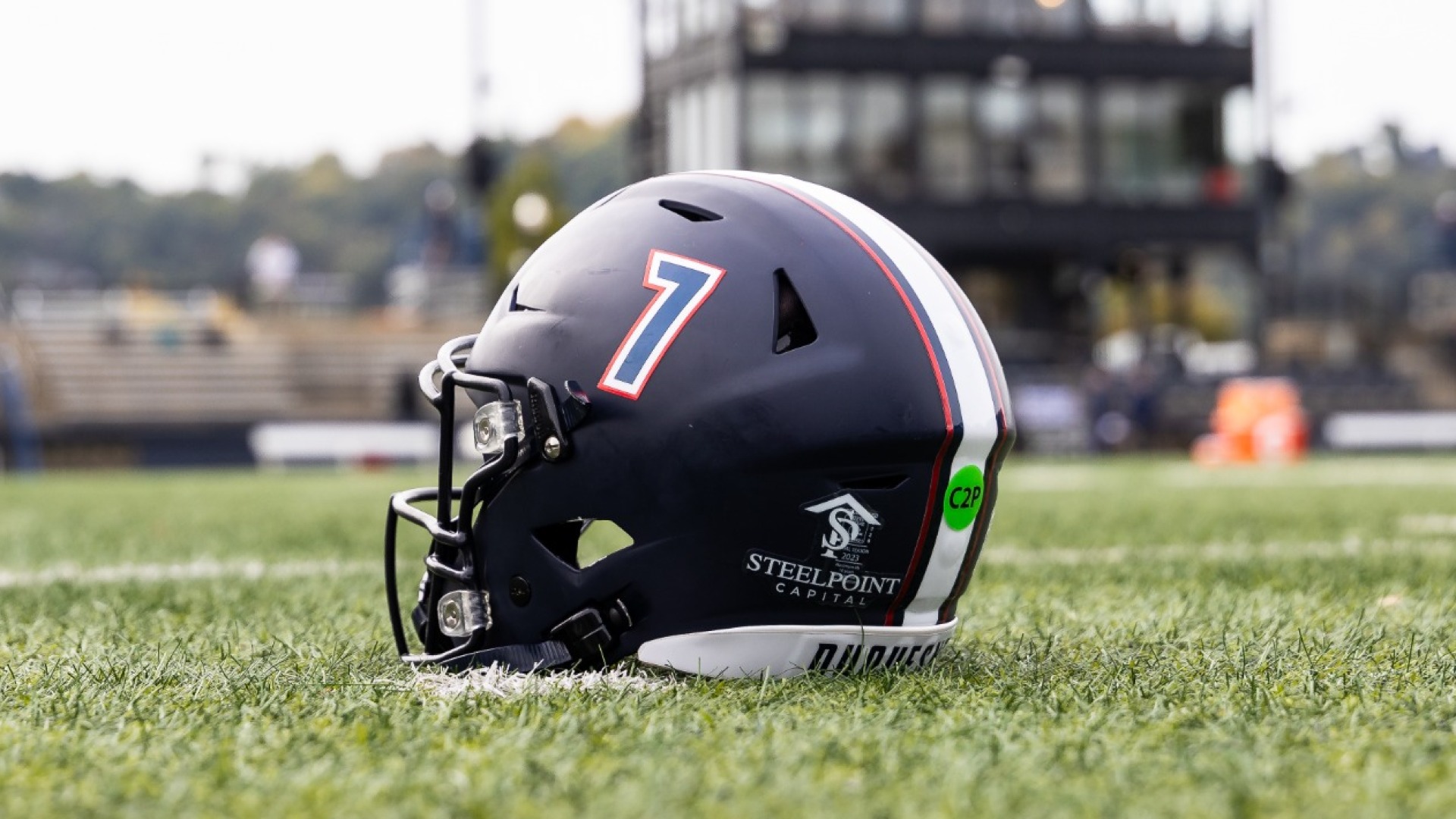 football helmet on rooney field with steelpoint logo sticker