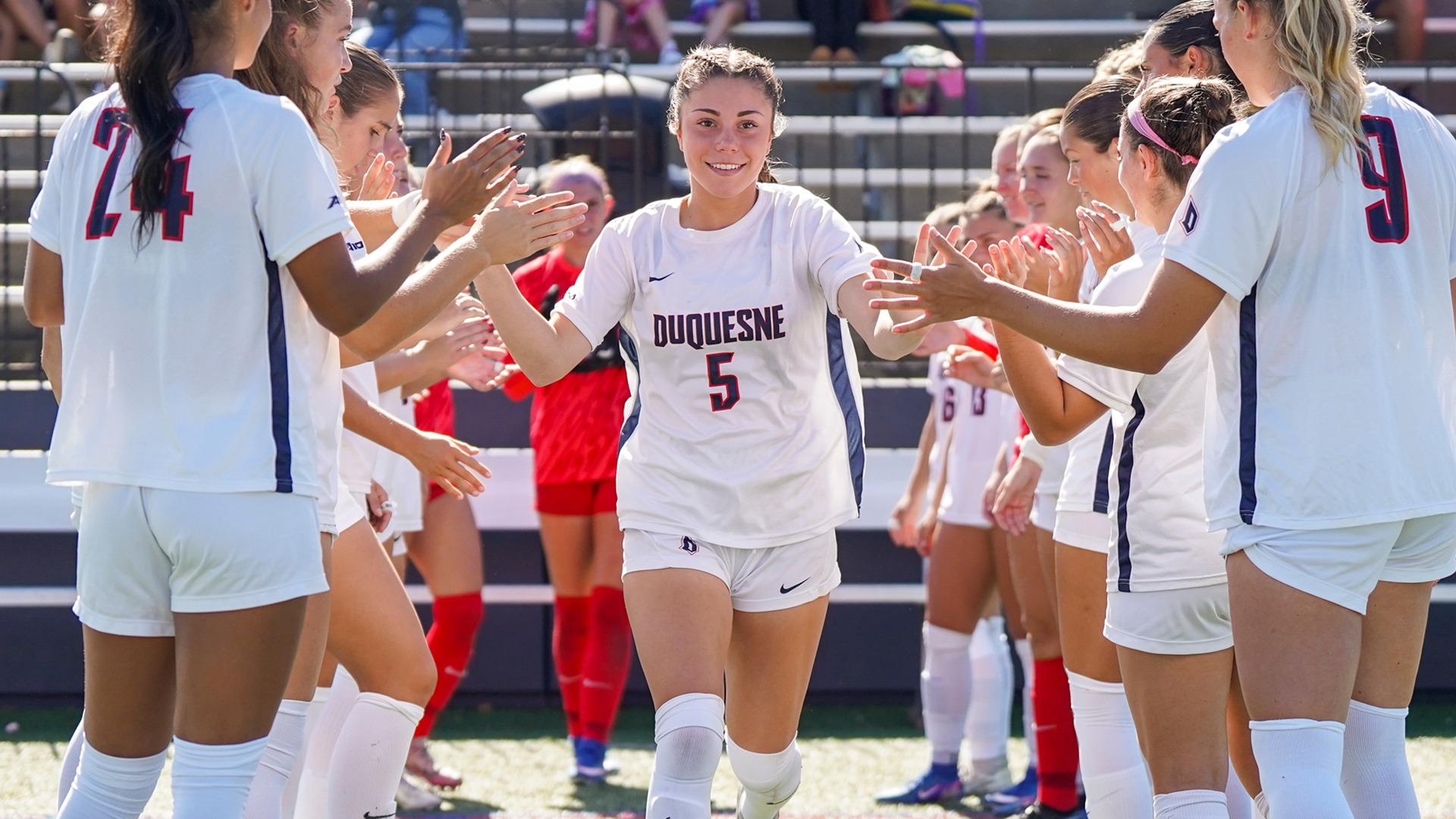 Lily De Jesus during starting lineups vs. GW at Rooney Field.