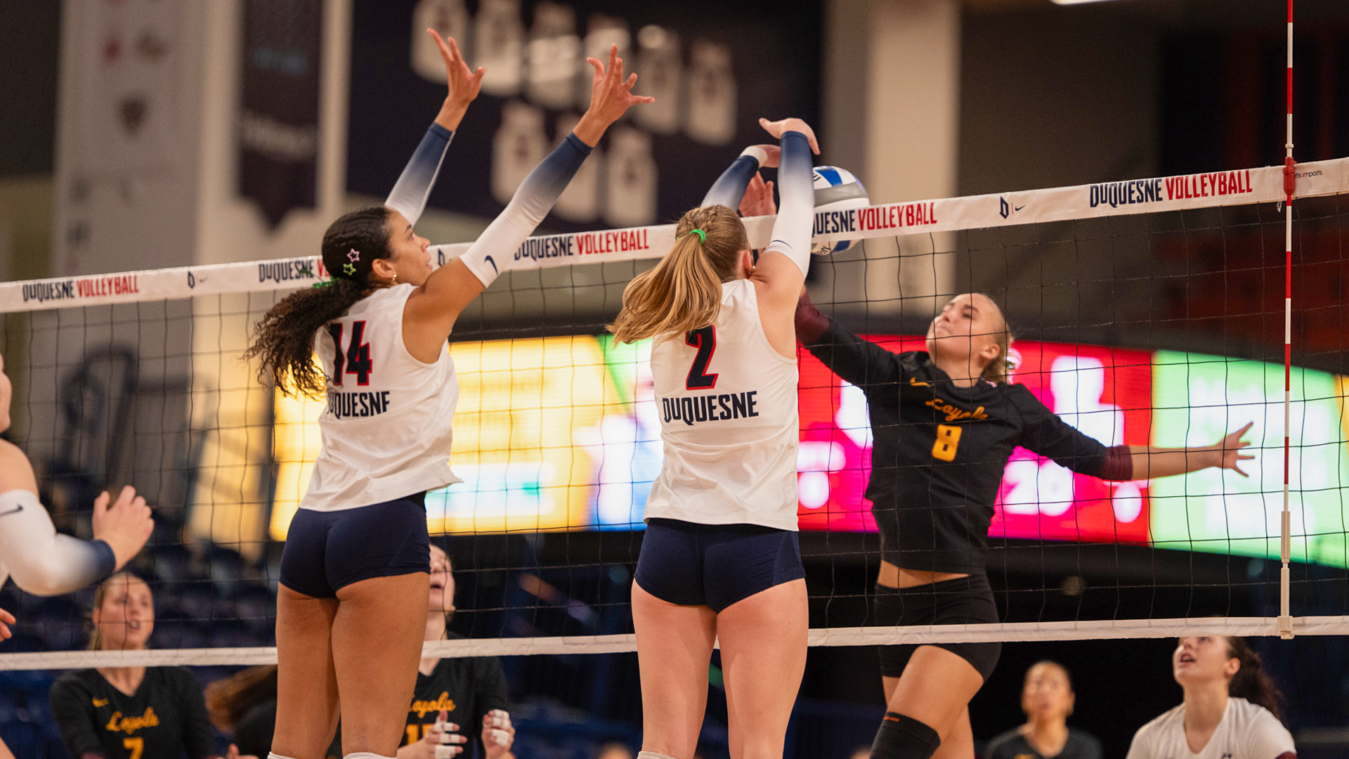 Jordan Robertson, Chloe Wilmot block vs. Loyola Chicago