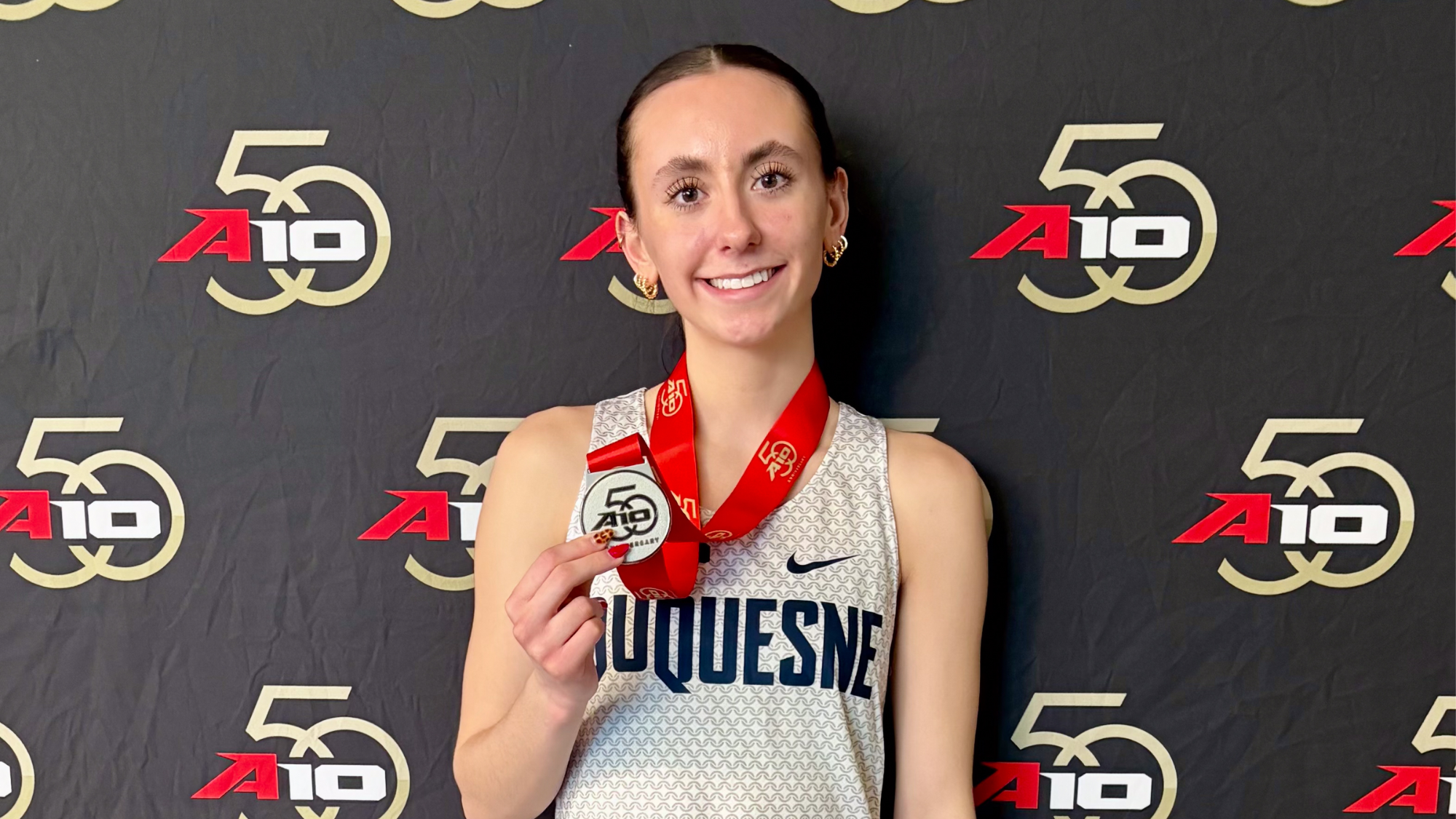 kashak photo with silver medal at a-10 indoors 2026