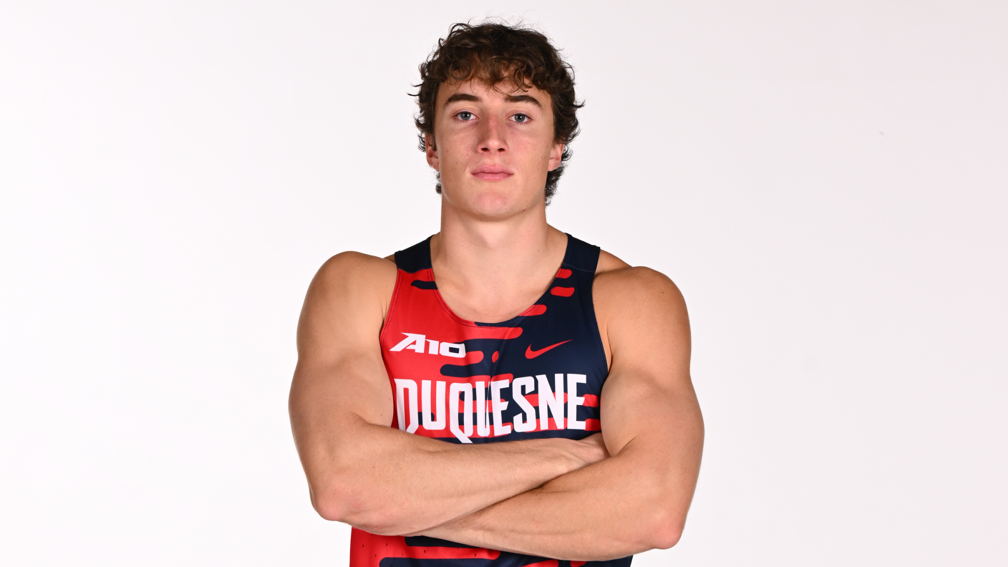 christian cupp with arms crossed from 2025-26 media day