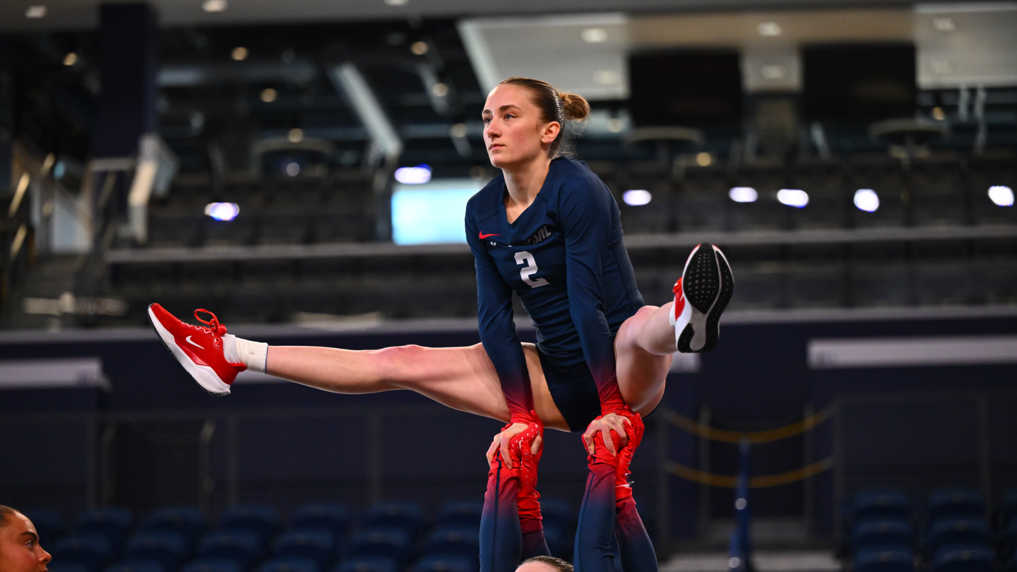 carly longenecker acro action photo 2026