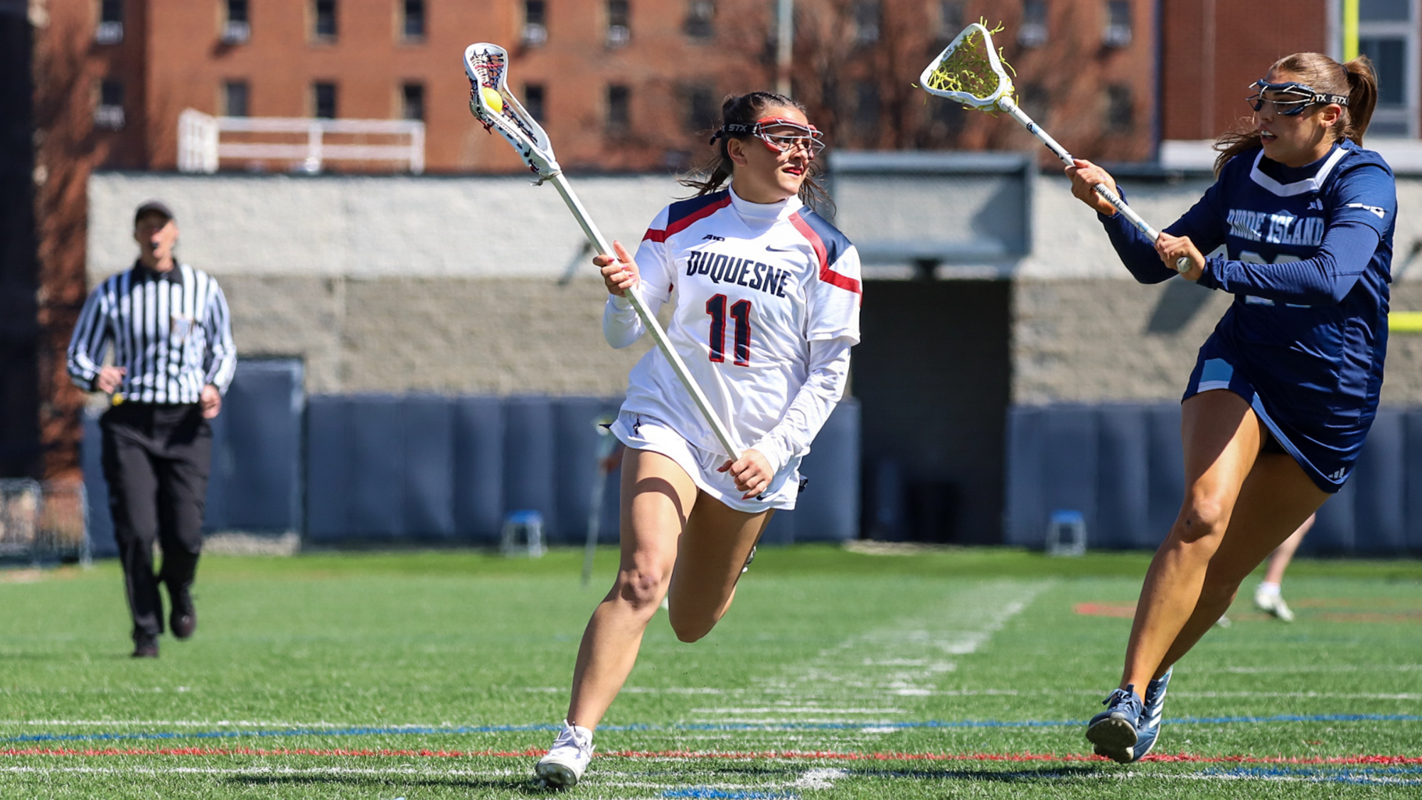 julia nitti runs with lax ball vs. URI 2026