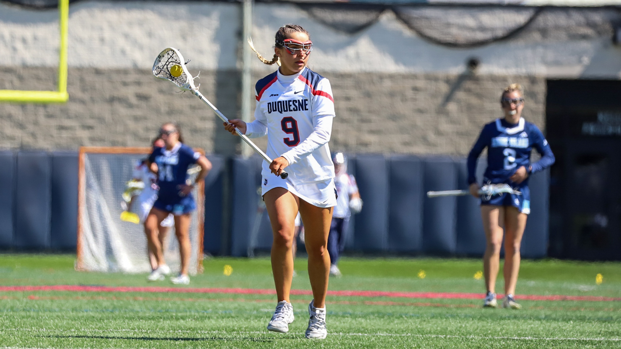 addison scanlon runs during lax game vs. URI 2026
