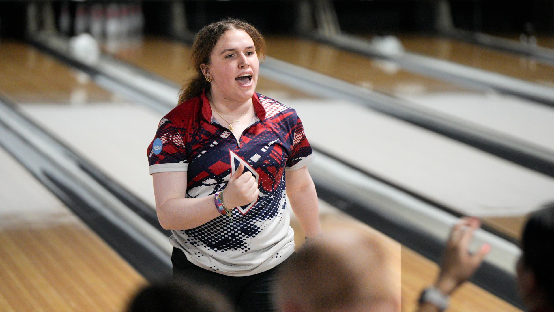 Maribeth Baker celebrates at AMF Mt. Lebanon Lanes in the NCAA Championship.