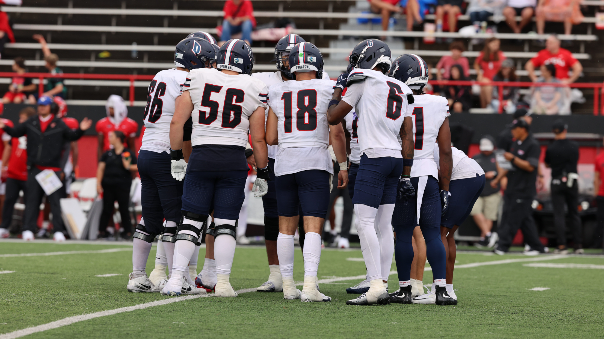 Football team huddle at YSU 2026