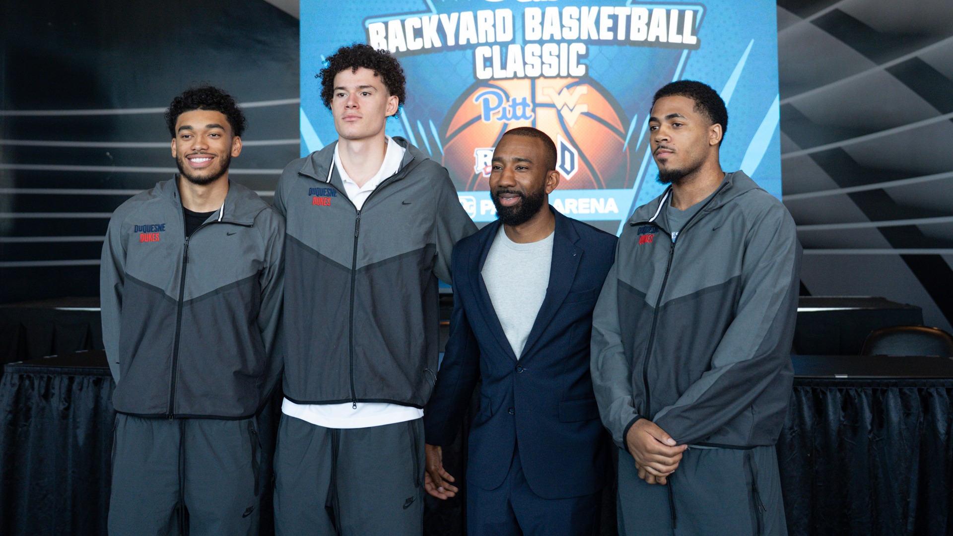 From left to right, Izaiah Pasha, Frederick Jellum, head coach Dru Joyce III and Josh Smith at the Hope Gas Backyard Basketball Classic press conference.