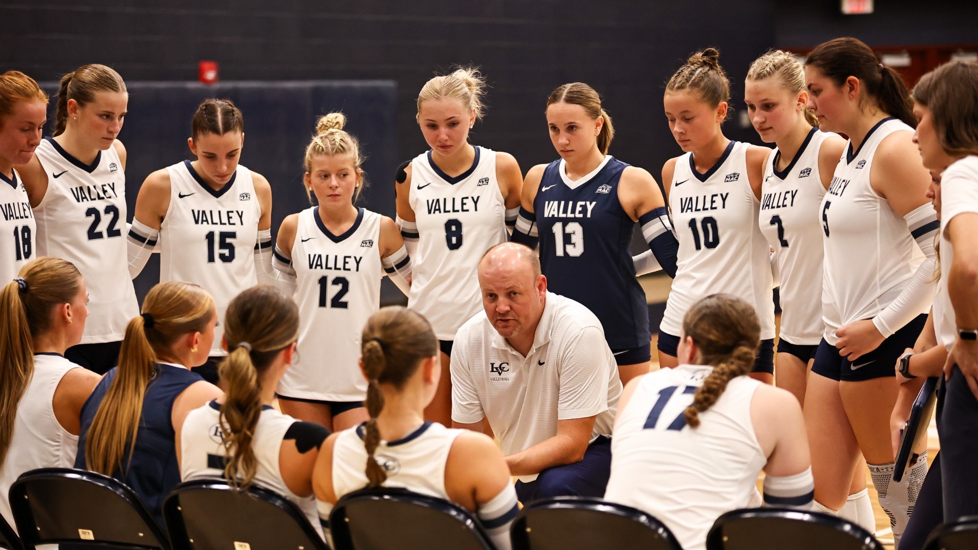 volleyball team during timeout