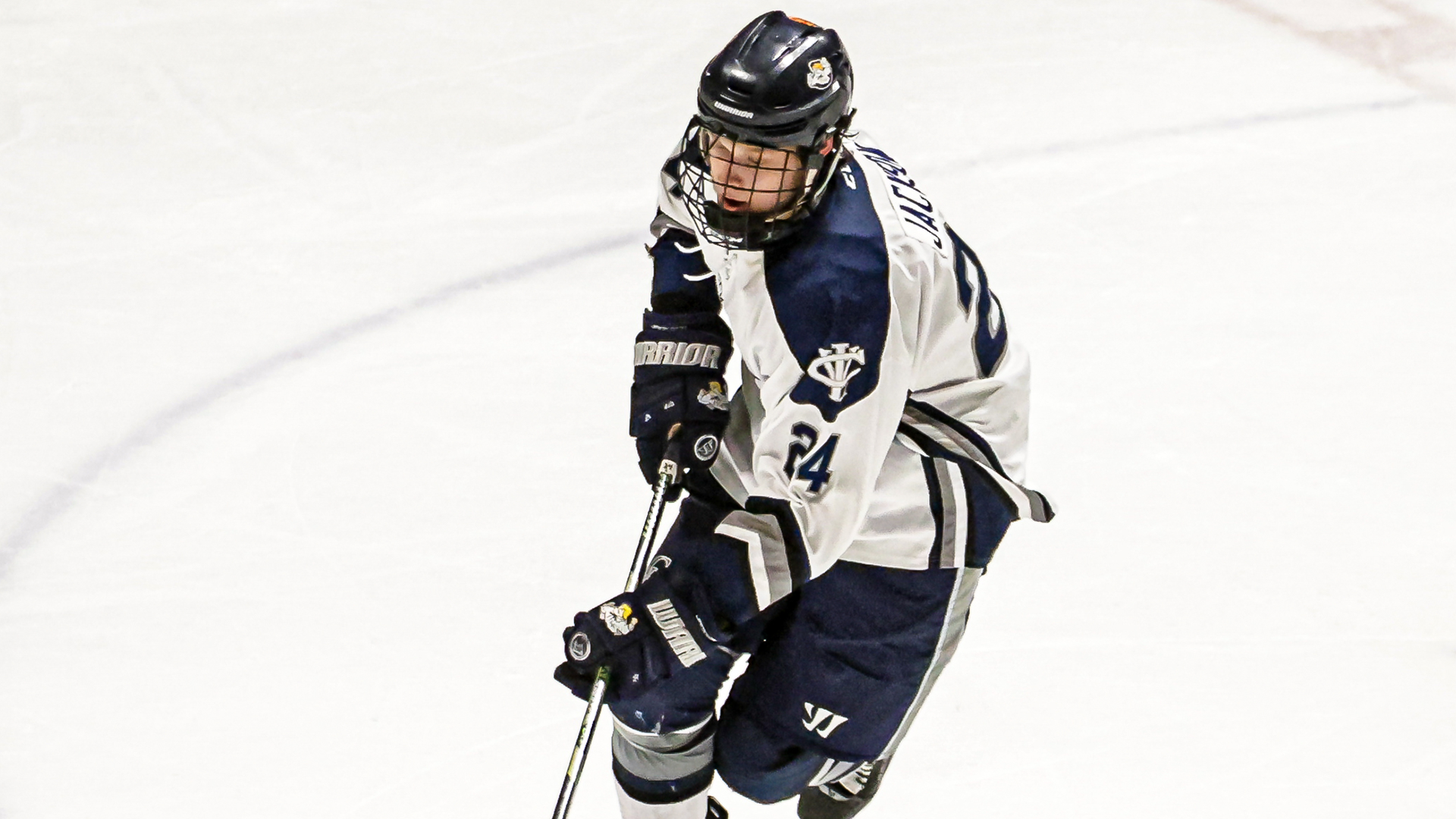 Garret Jackson looks toward the puck