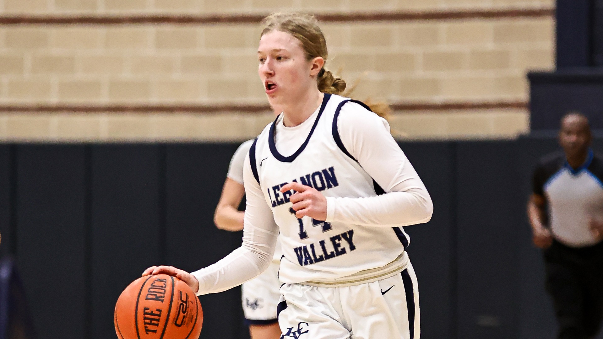 Riley Hevelow bringing the ball up the court