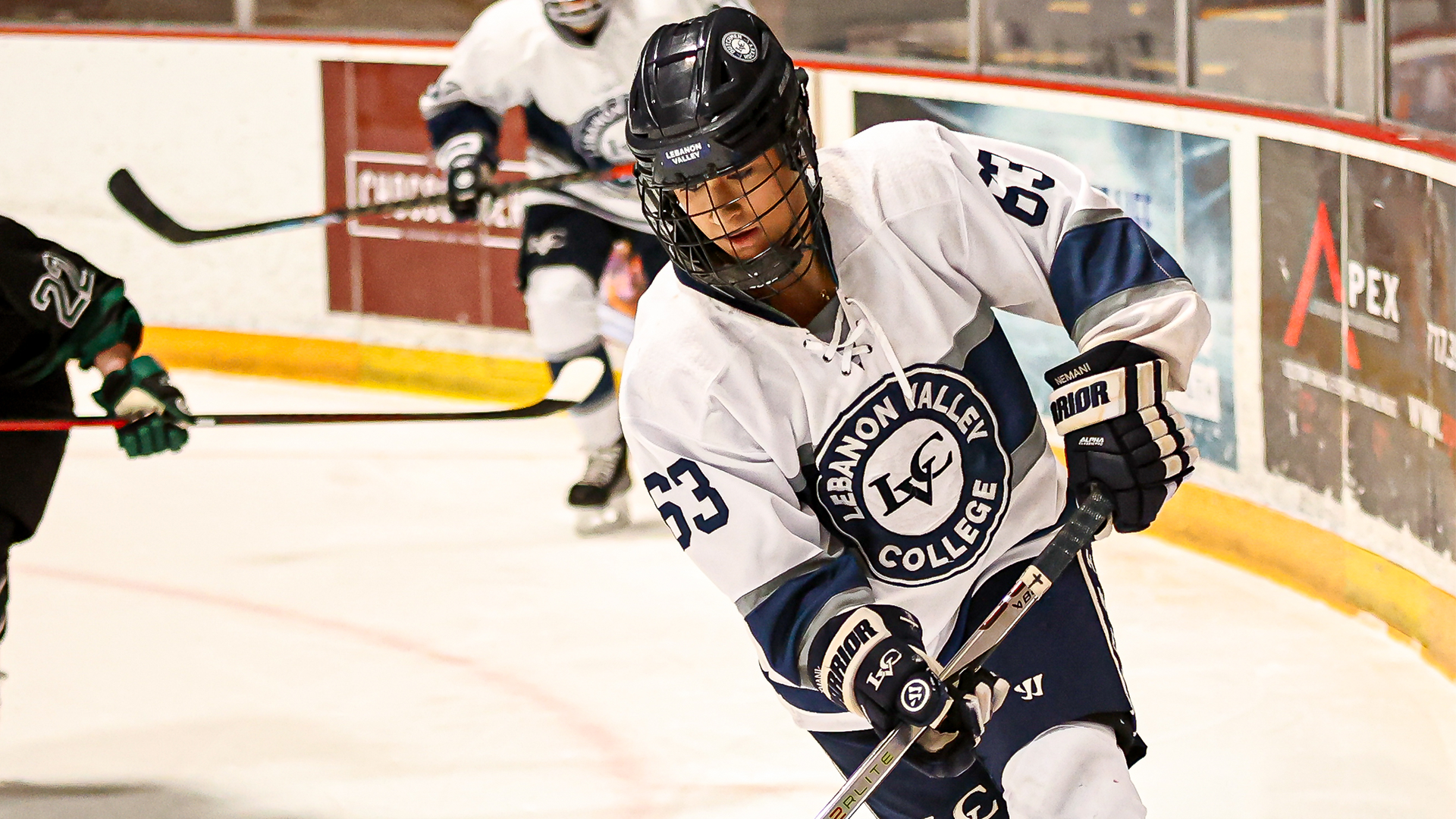 Leela Nemani looks at the puck