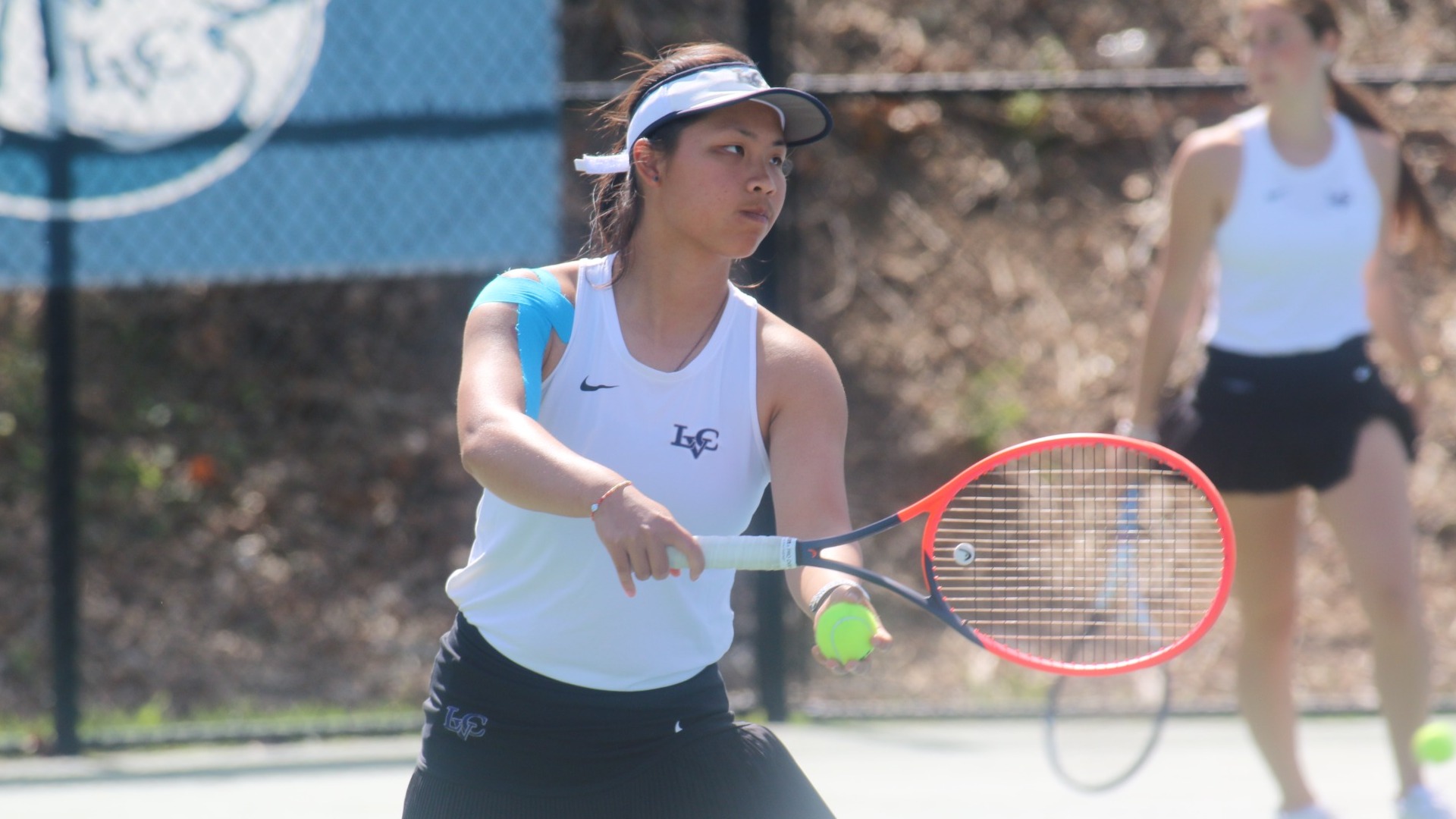 Catherine Stone getting ready for serve