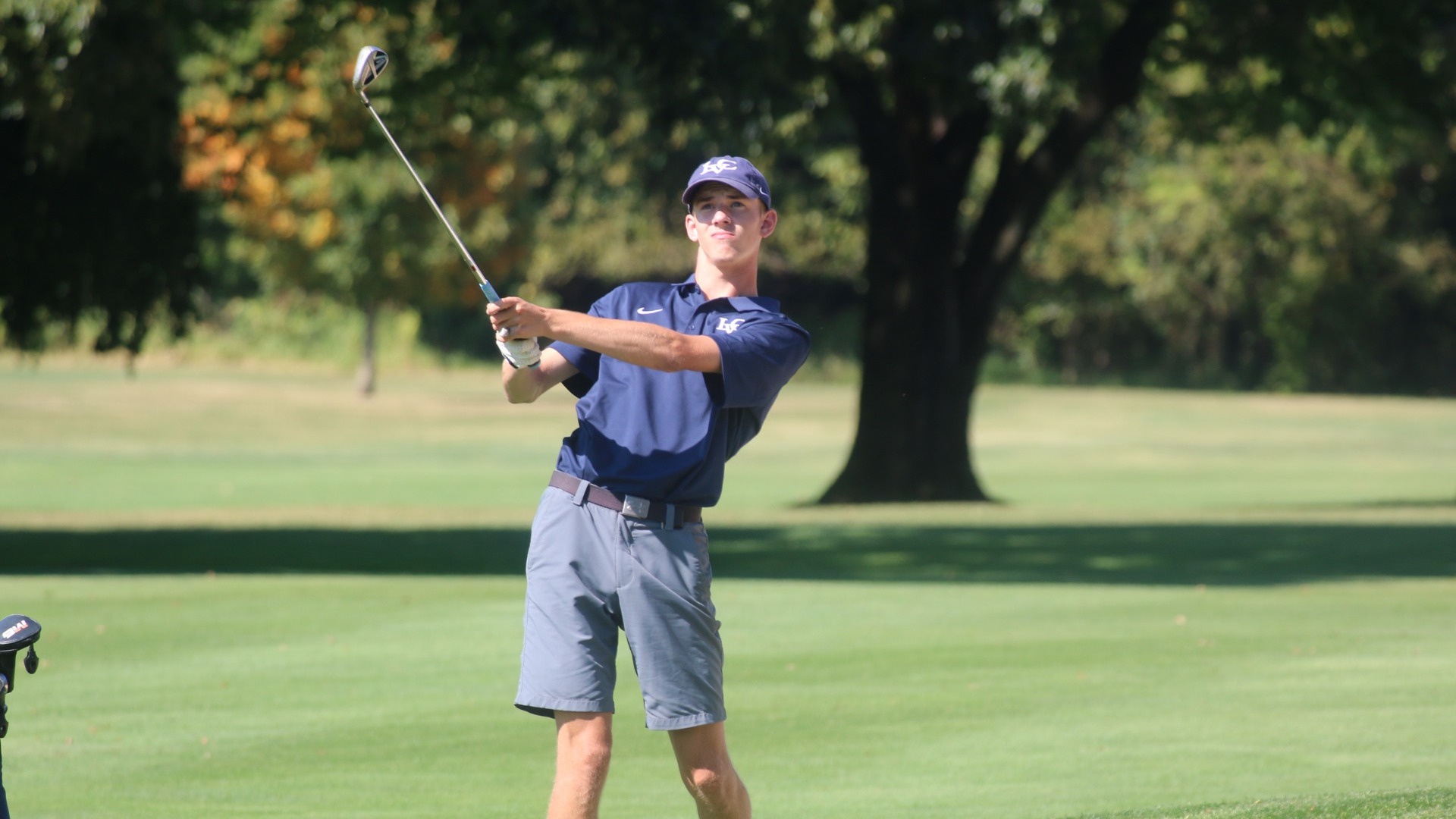 Brayden Herr watching shot onto green