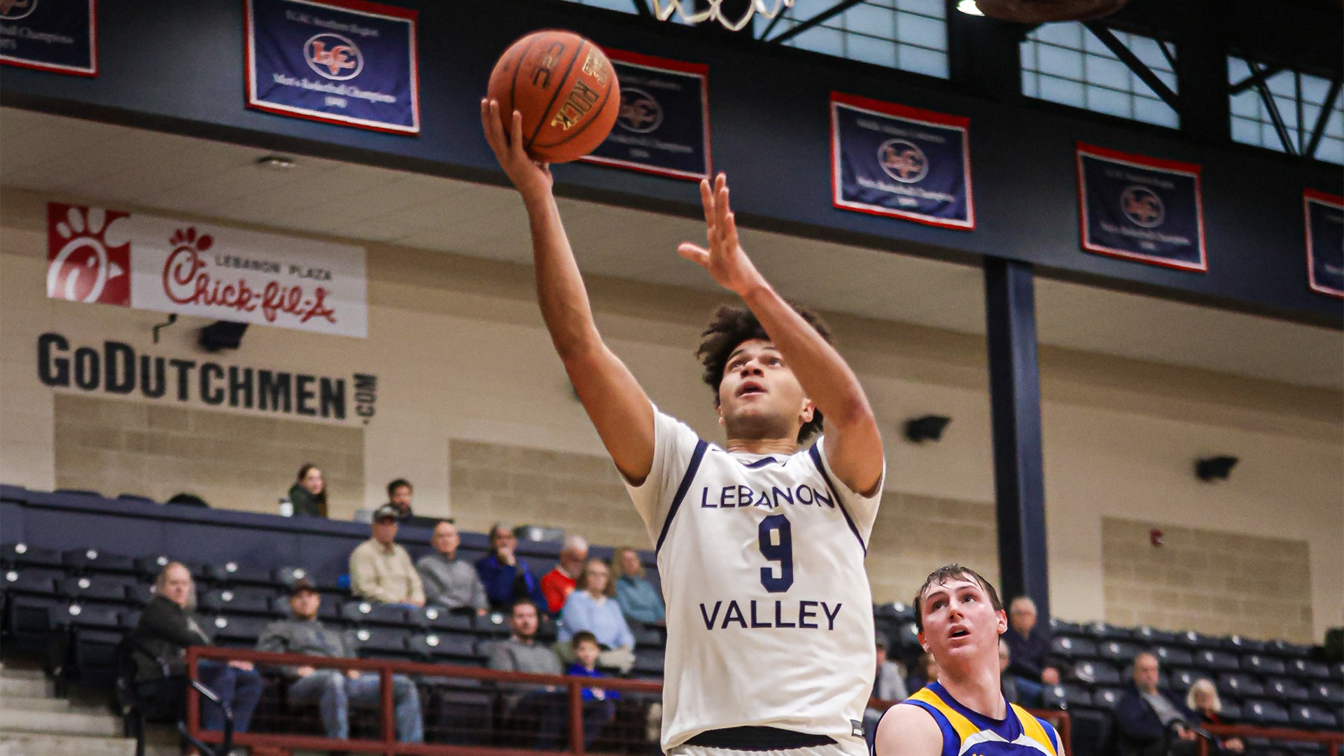 Giovanni Sejuste taking the ball to the rim