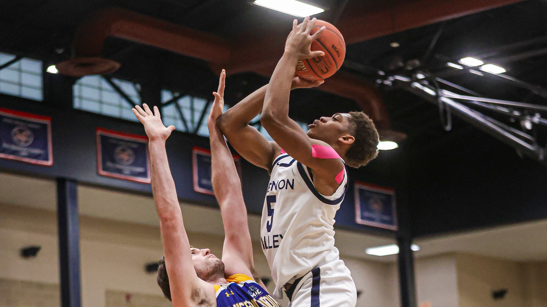 Demarcus Bandy rising above defender for shot