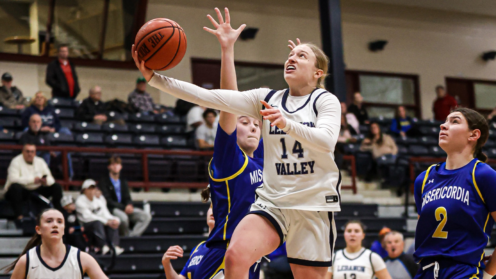 Riley Hevelow scoring on a layup
